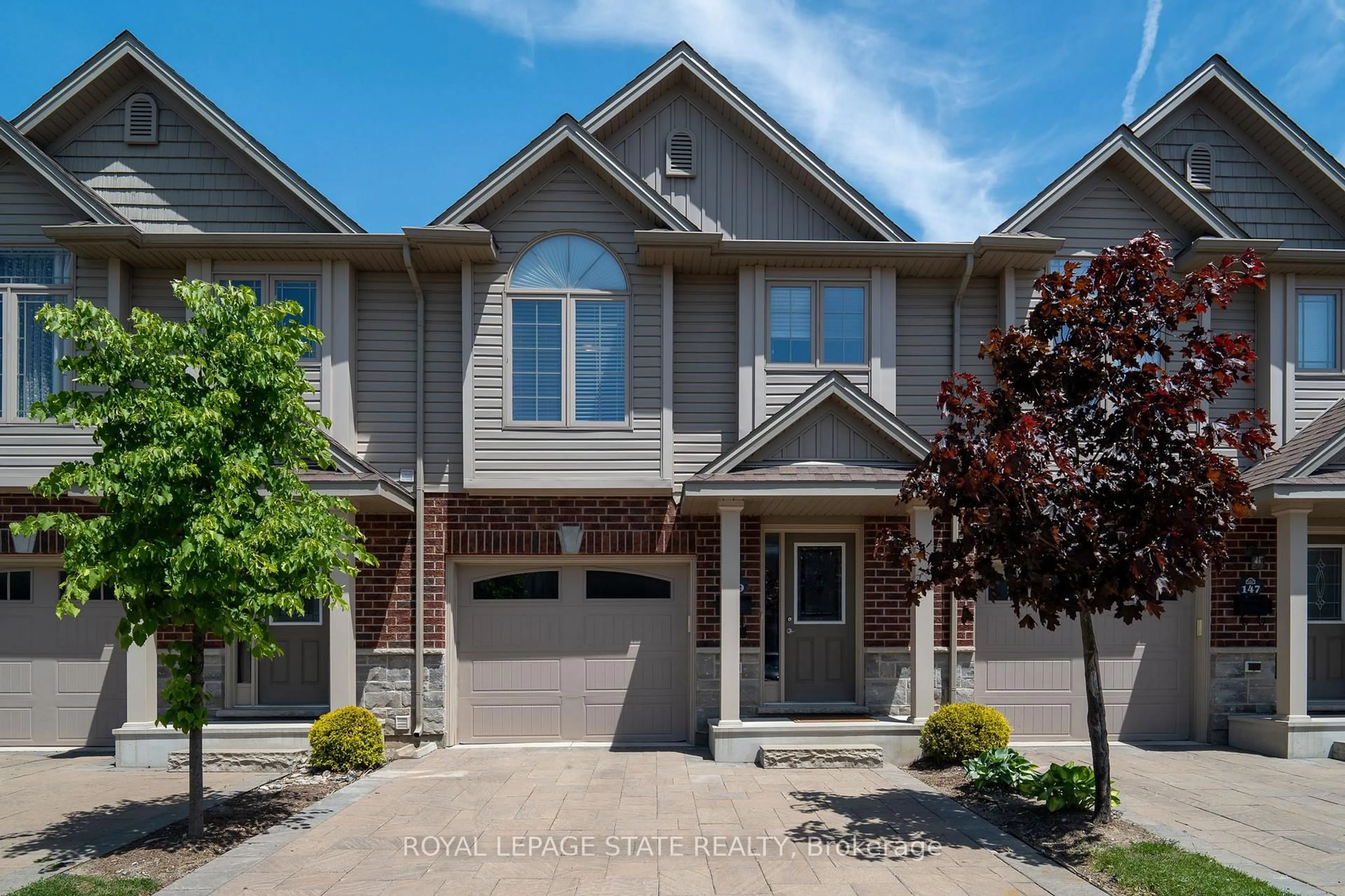 Home with brick exterior material, street for 1061 Eagletrace Dr #149, London North Ontario N6G 0T3