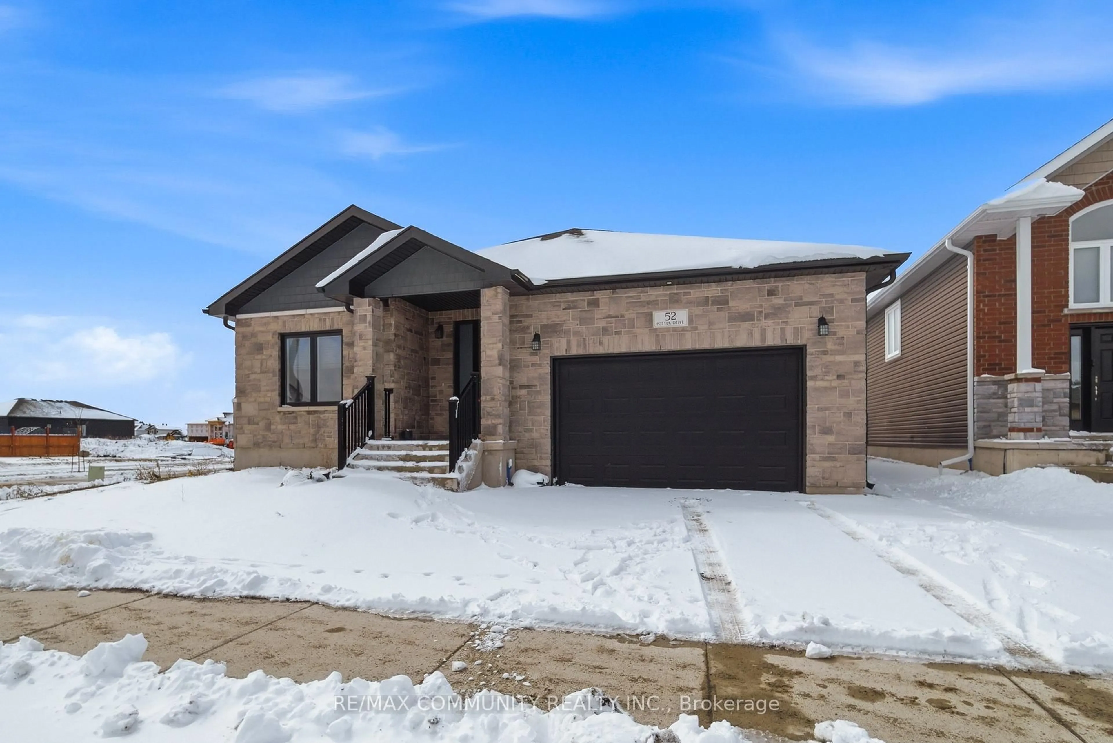 Home with brick exterior material, street for 52 Potter Dr, Bissett Creek Ontario K0H 2H0