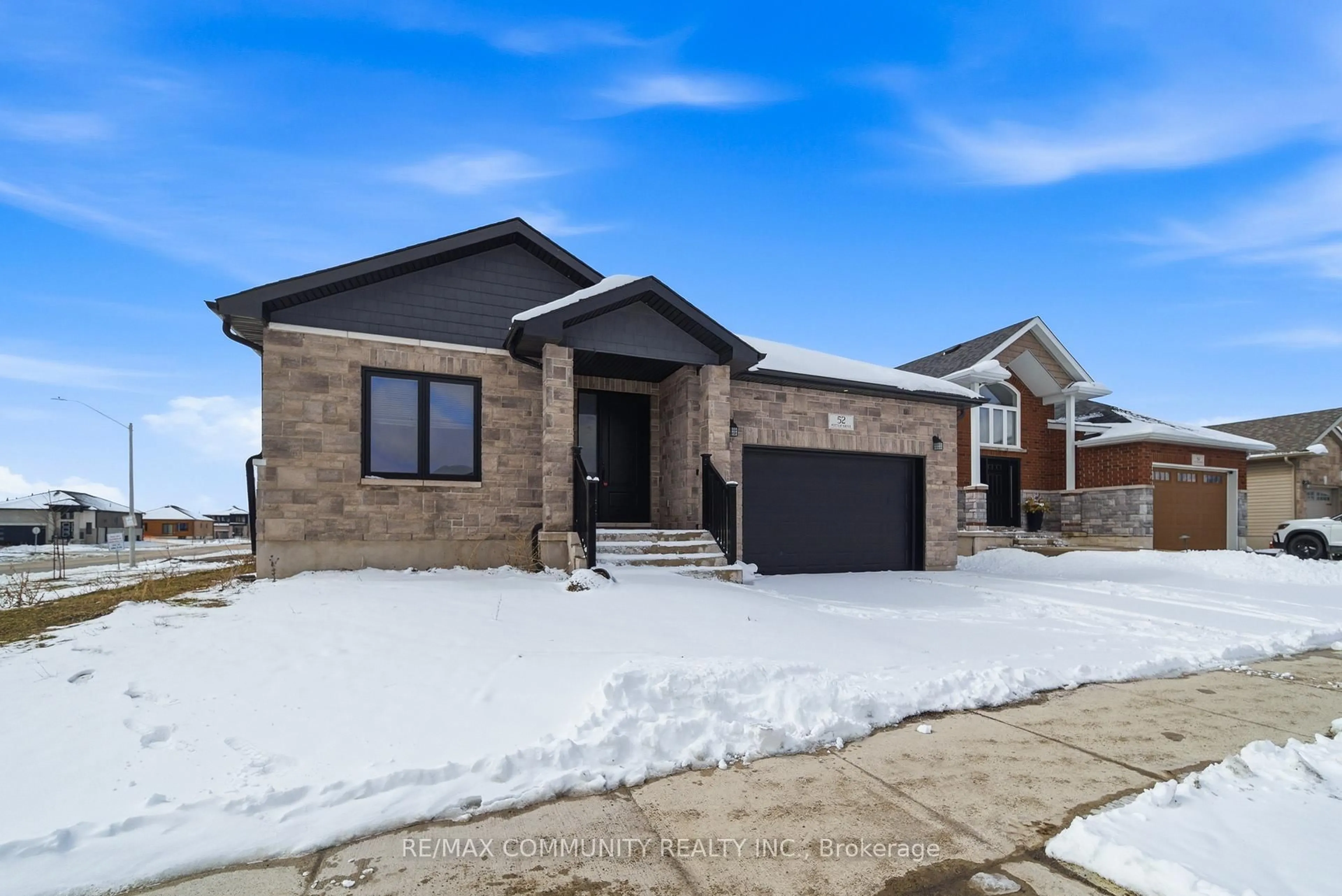 Home with brick exterior material, street for 52 Potter Dr, Bissett Creek Ontario K0H 2H0