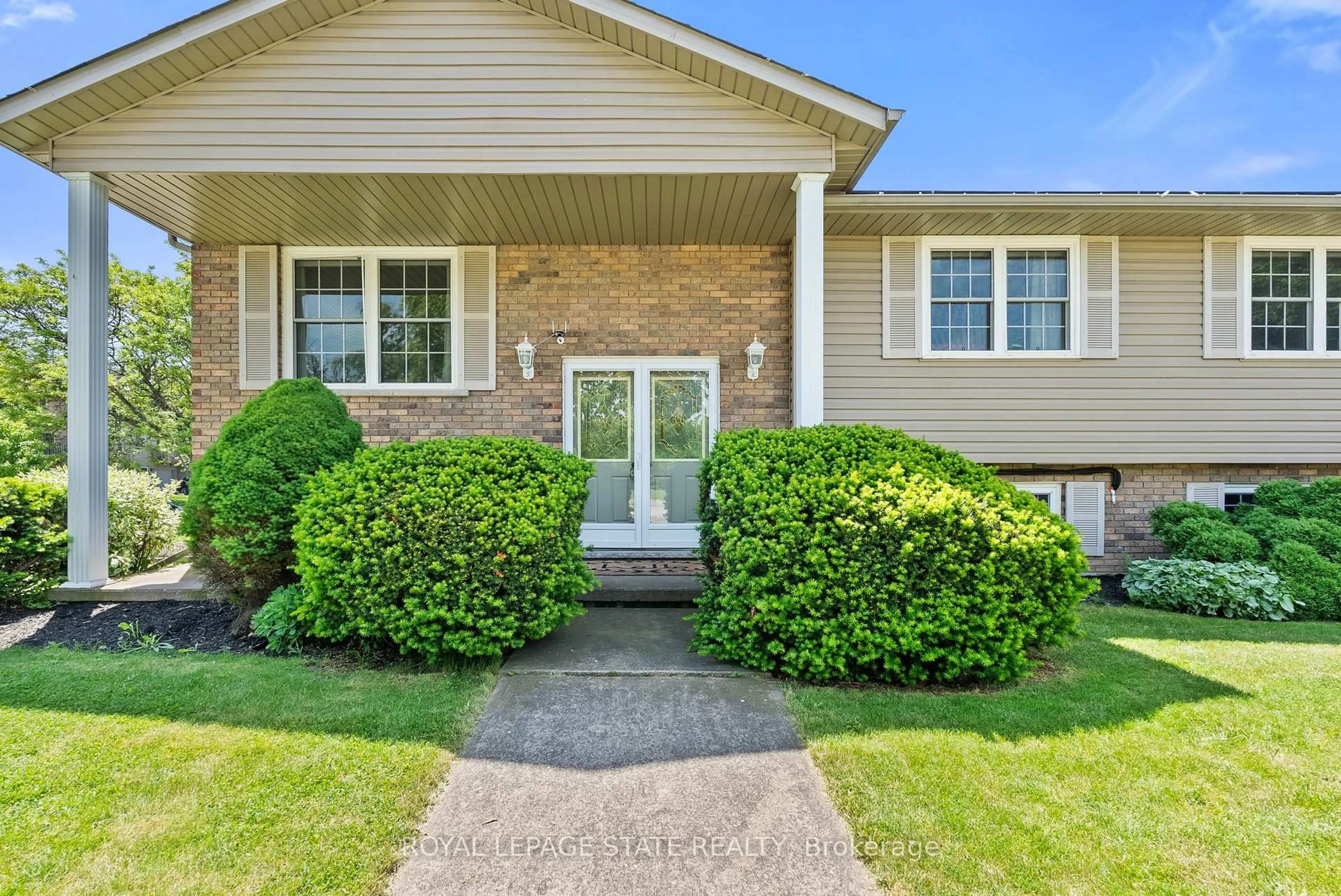 Home with brick exterior material, street for 83 Amberwood St, Hamilton Ontario L8J 1Z8