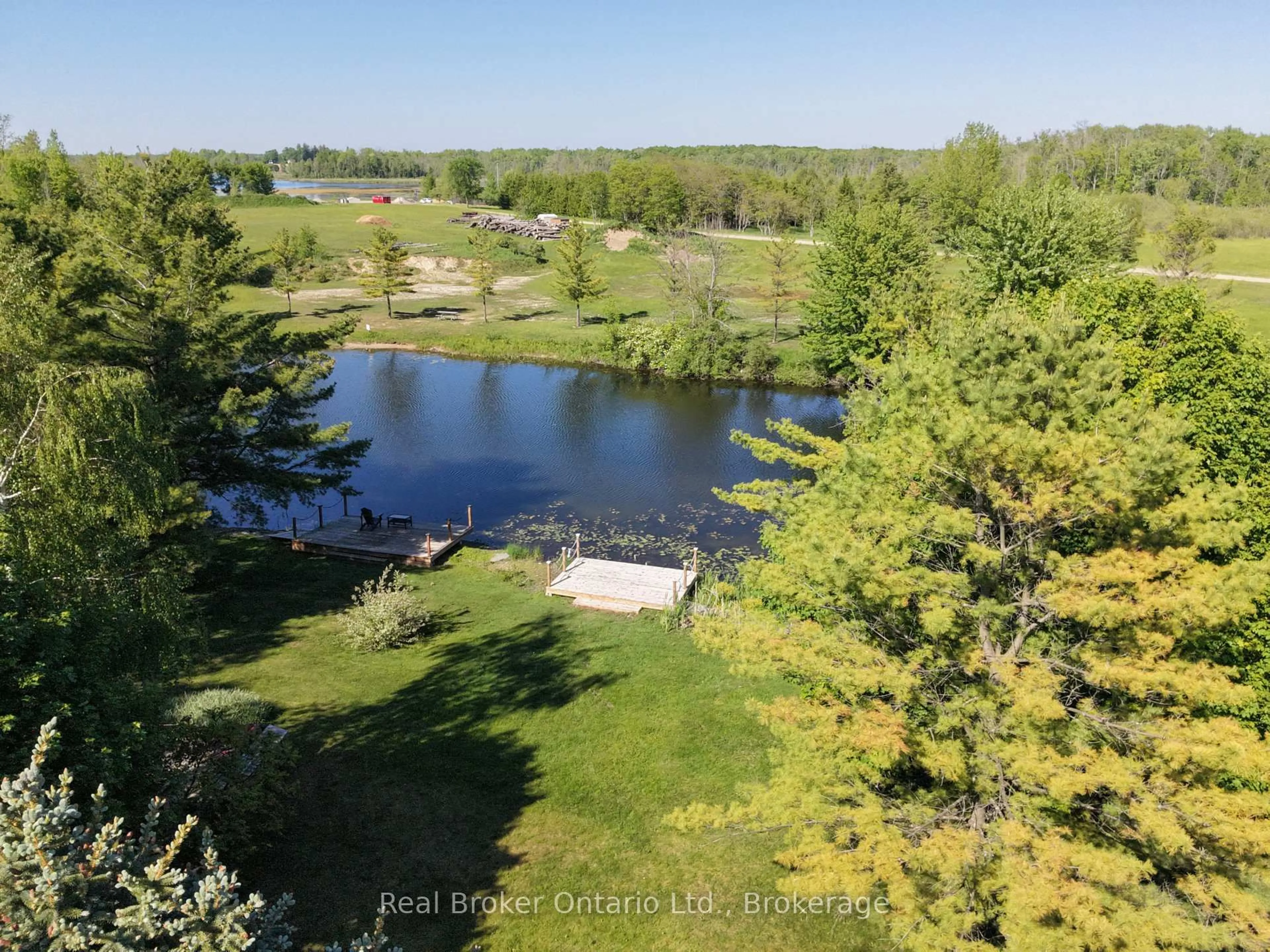 A pic from outside/outdoor area/front of a property/back of a property/a pic from drone, water/lake/river/ocean view for 13 Southline Ave #M39, Huron-Kinloss Ontario N2Z 2X5