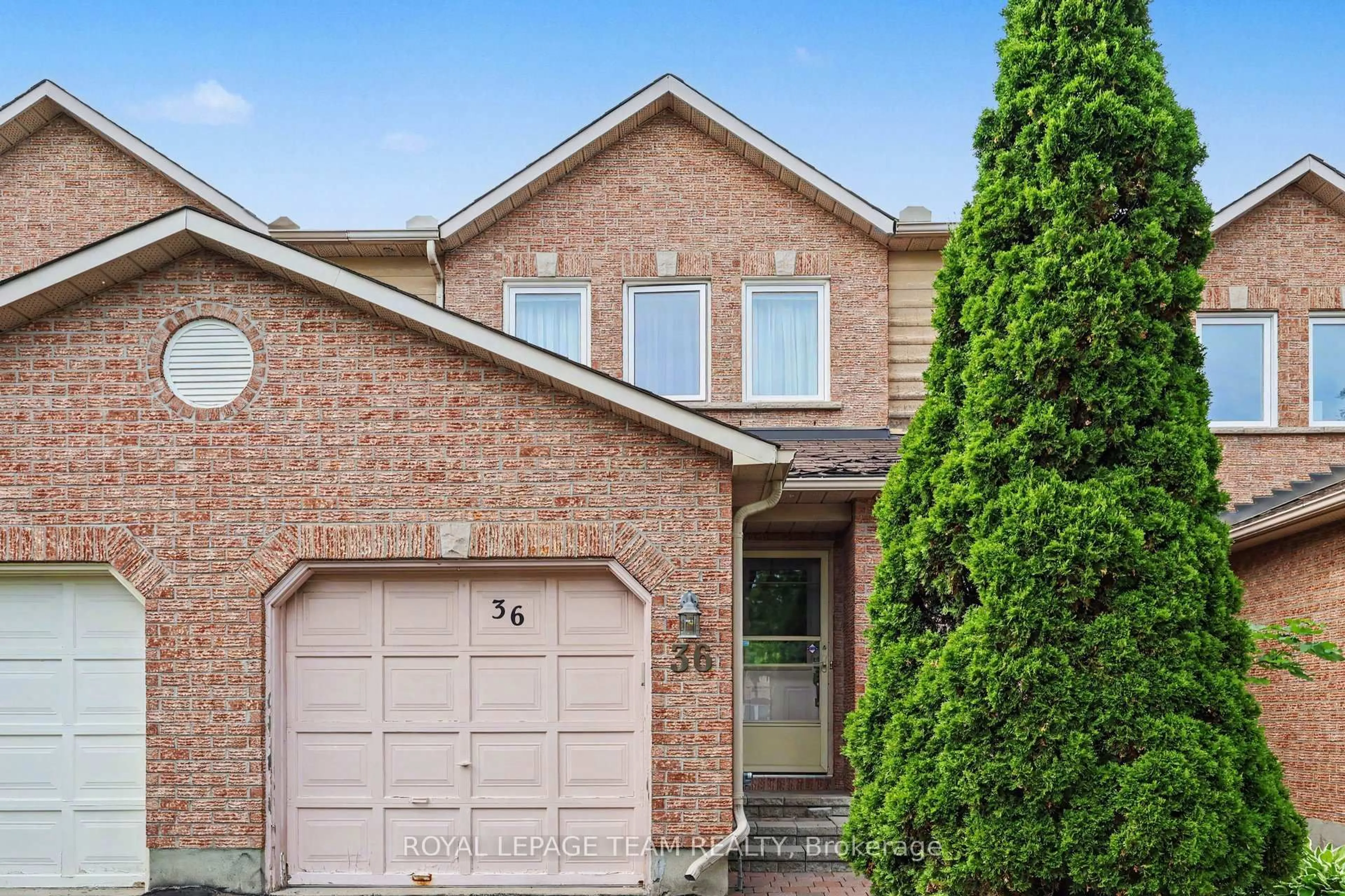 Home with brick exterior material, street for 36 Southport Dr, Ottawa Ontario K1T 3E7