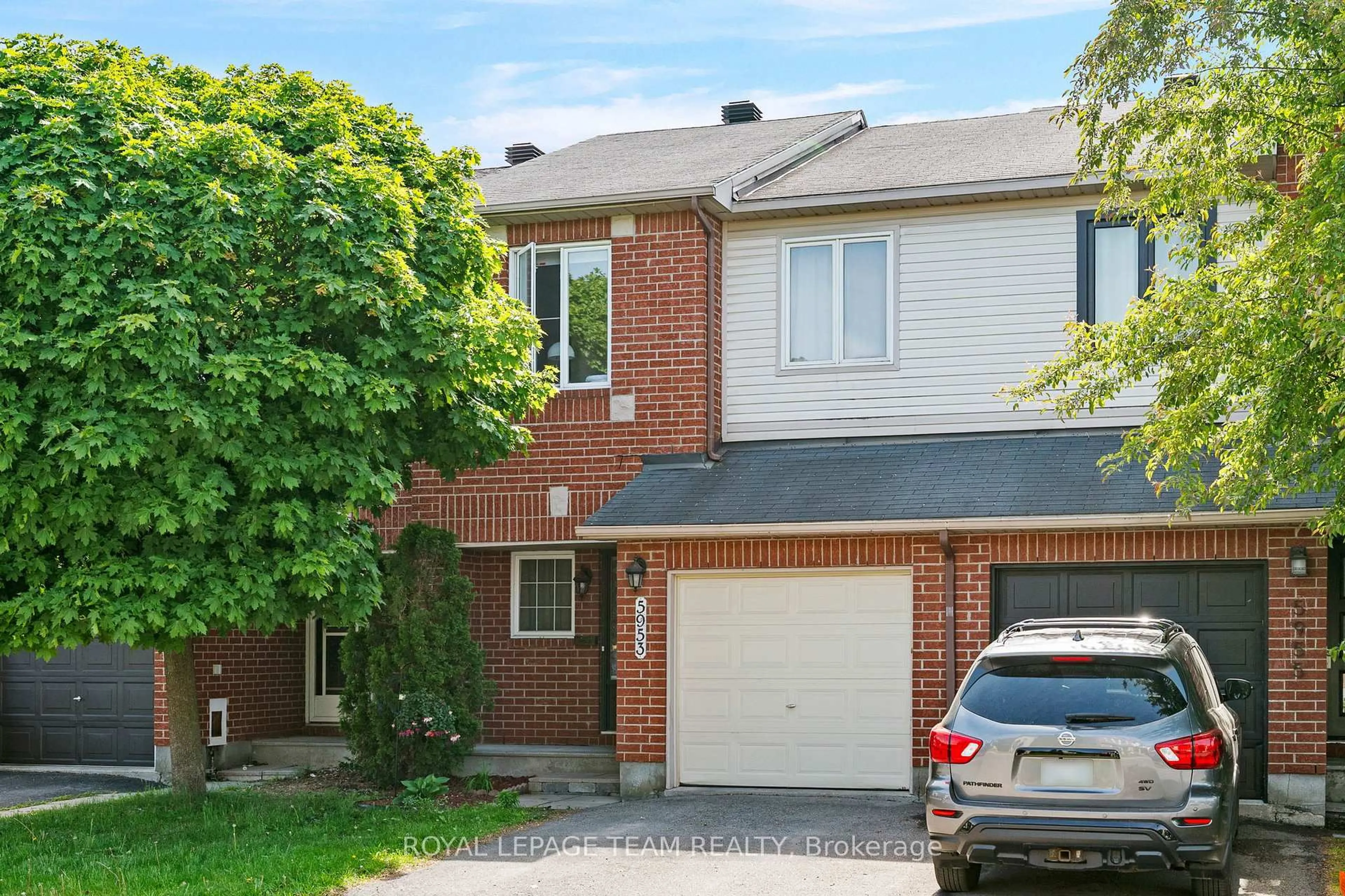 Home with brick exterior material, street for 5953 Pineglade Cres, Ottawa Ontario K1W 1G9