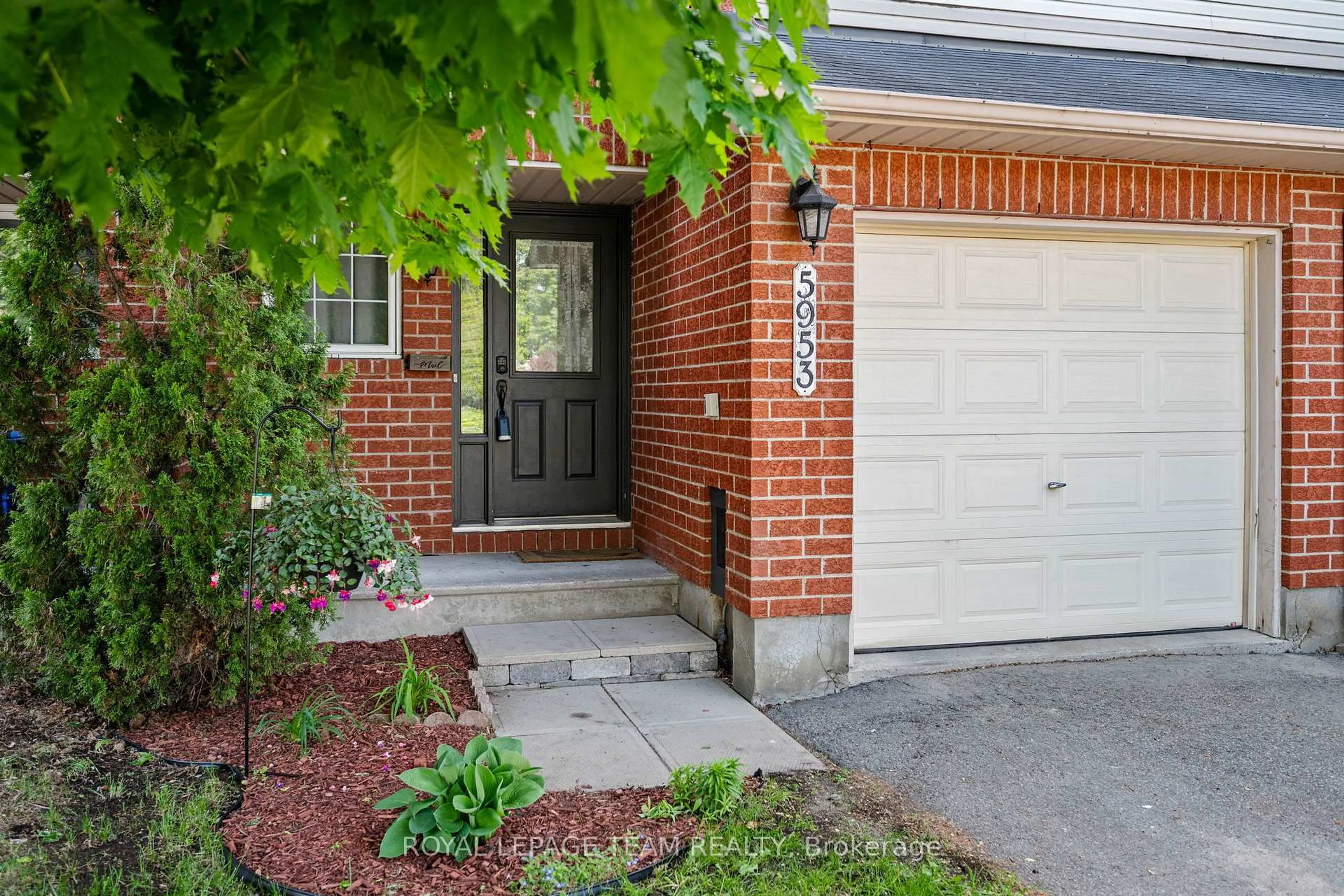 Home with brick exterior material, street for 5953 Pineglade Cres, Ottawa Ontario K1W 1G9