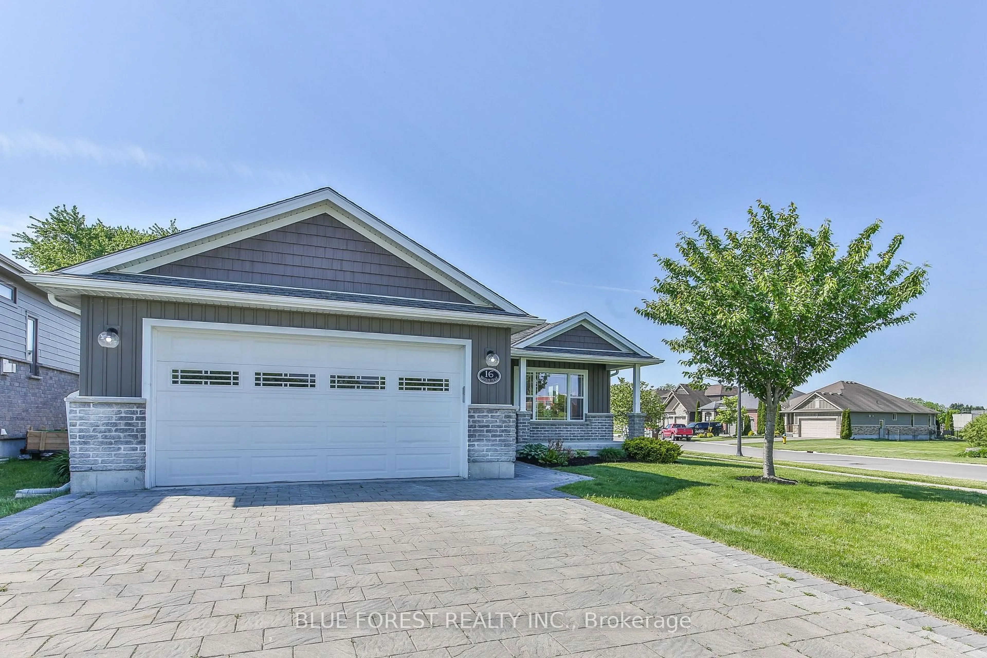 Home with vinyl exterior material, street for 16 Brooker Tr, Thames Centre Ontario N0M 2P0