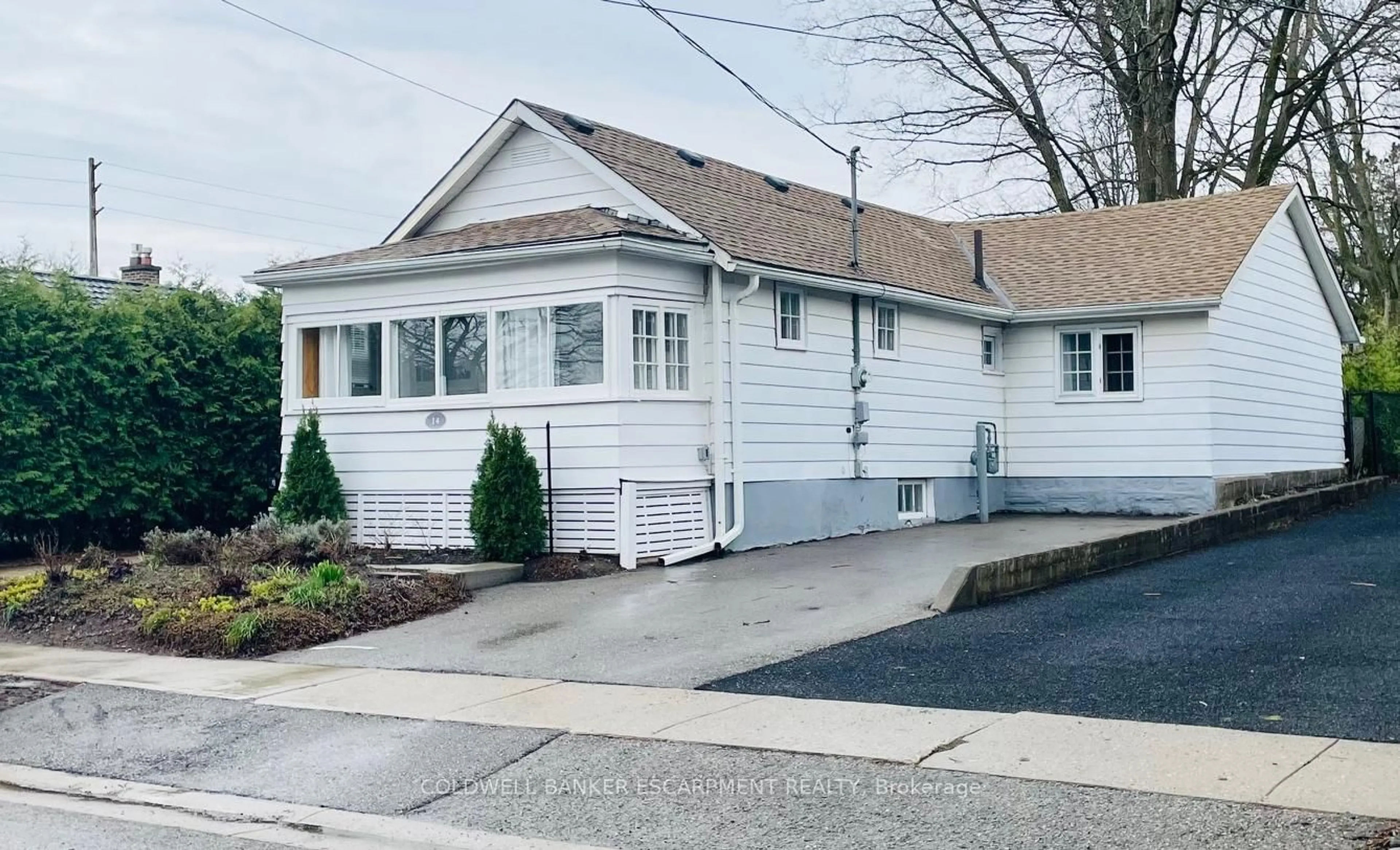 Home with vinyl exterior material, street for 14 Laurine Ave, Guelph Ontario N1E 4M9