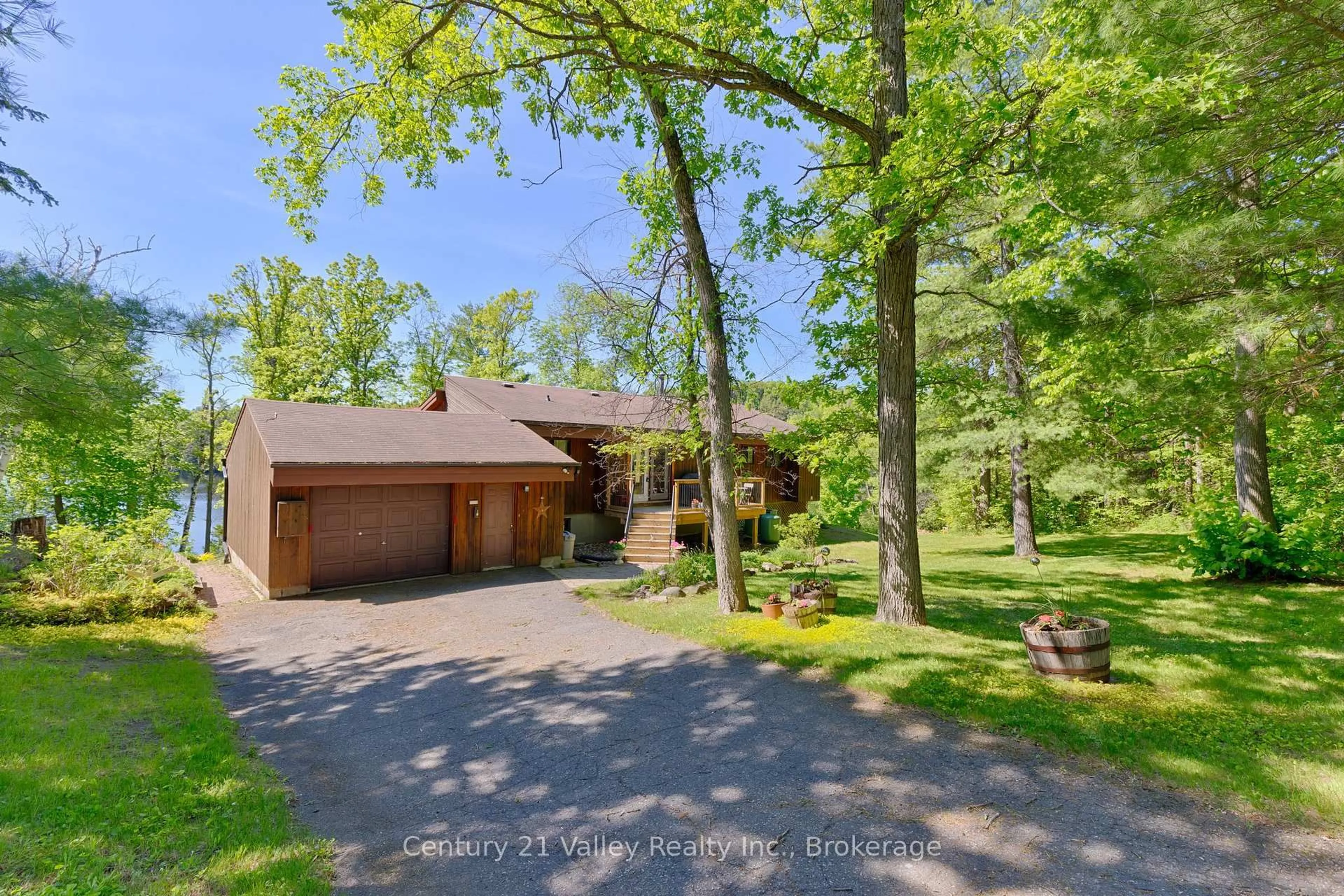 A pic from outside/outdoor area/front of a property/back of a property/a pic from drone, water/lake/river/ocean view for 3233 Calabogie Rd, Calabogie Ontario K0J 1H0