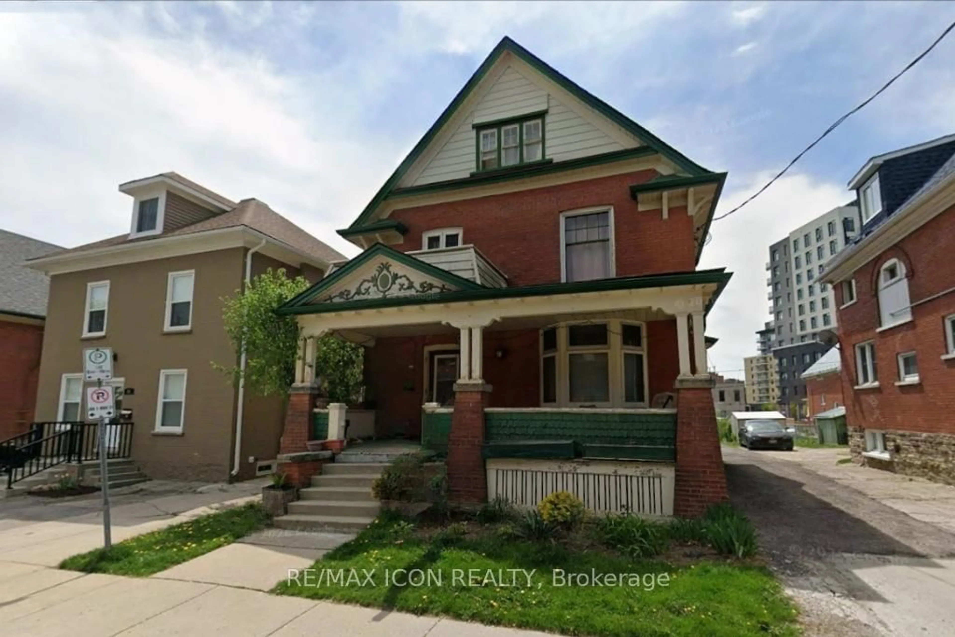 Home with brick exterior material, street for 59 Irvin St, Kitchener Ontario N2H 1K7