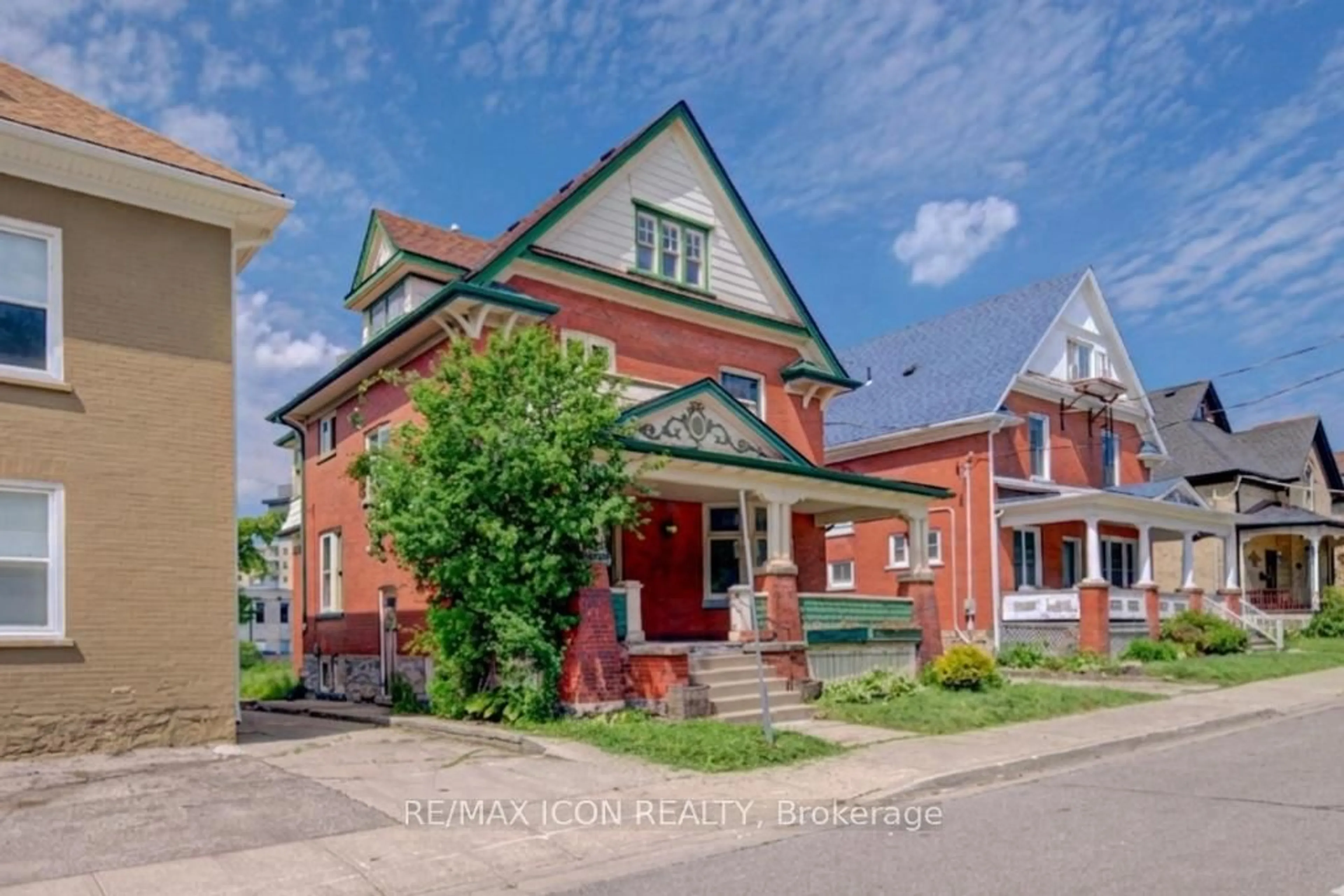 Home with brick exterior material, street for 59 Irvin St, Kitchener Ontario N2H 1K7