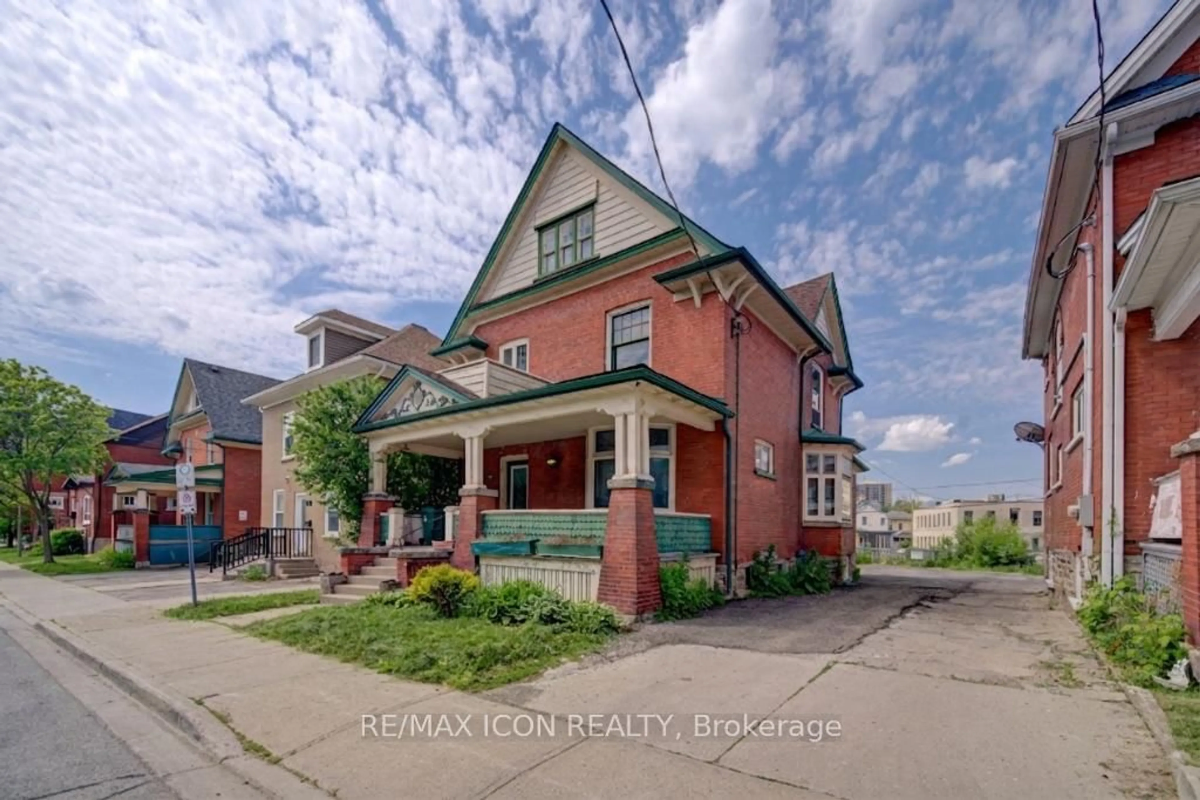 Home with brick exterior material, street for 59 Irvin St, Kitchener Ontario N2H 1K7