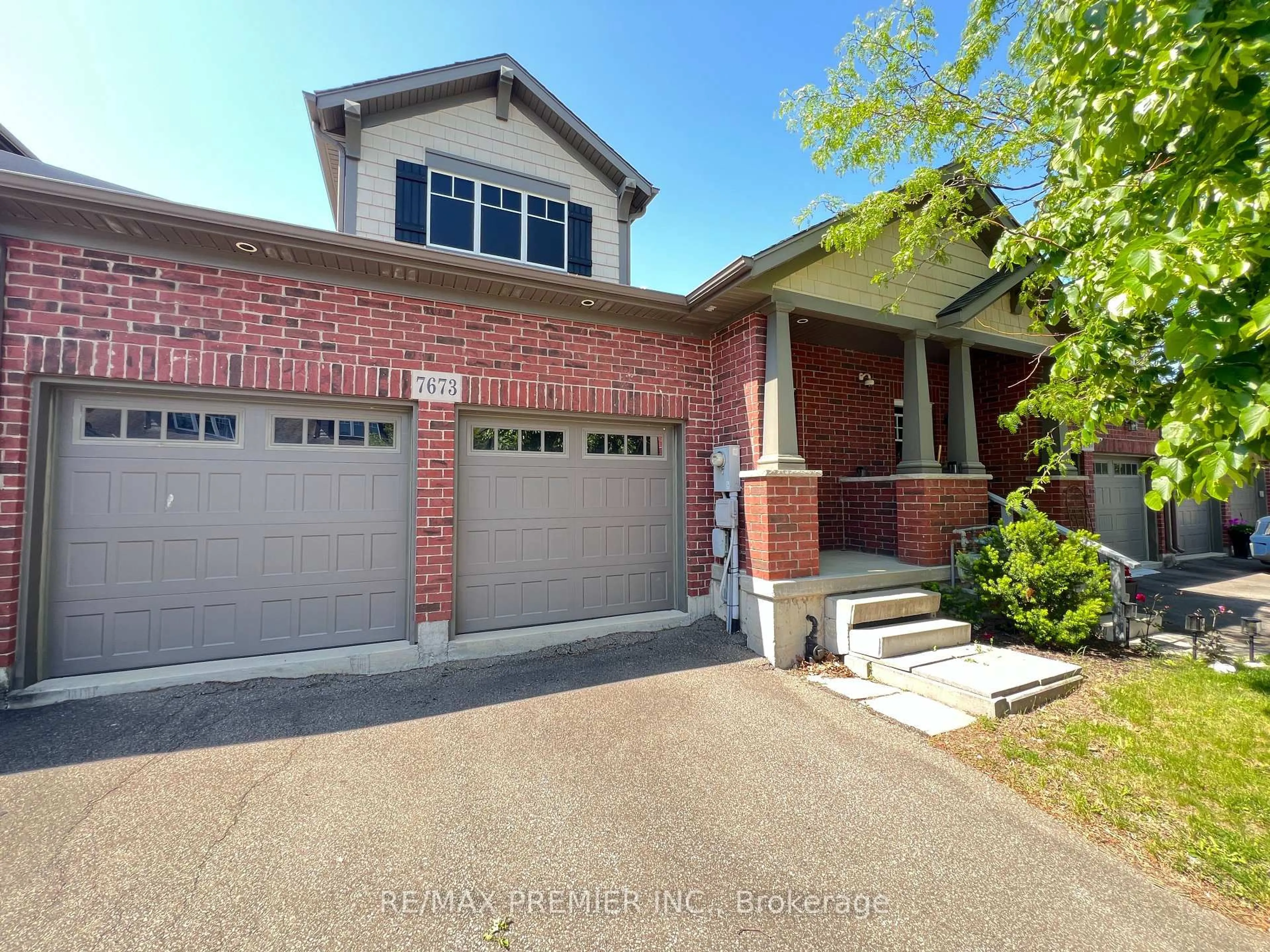 Home with brick exterior material, street for 7673 Green Vista Gate #140, Niagara Falls Ontario L2G 0A8