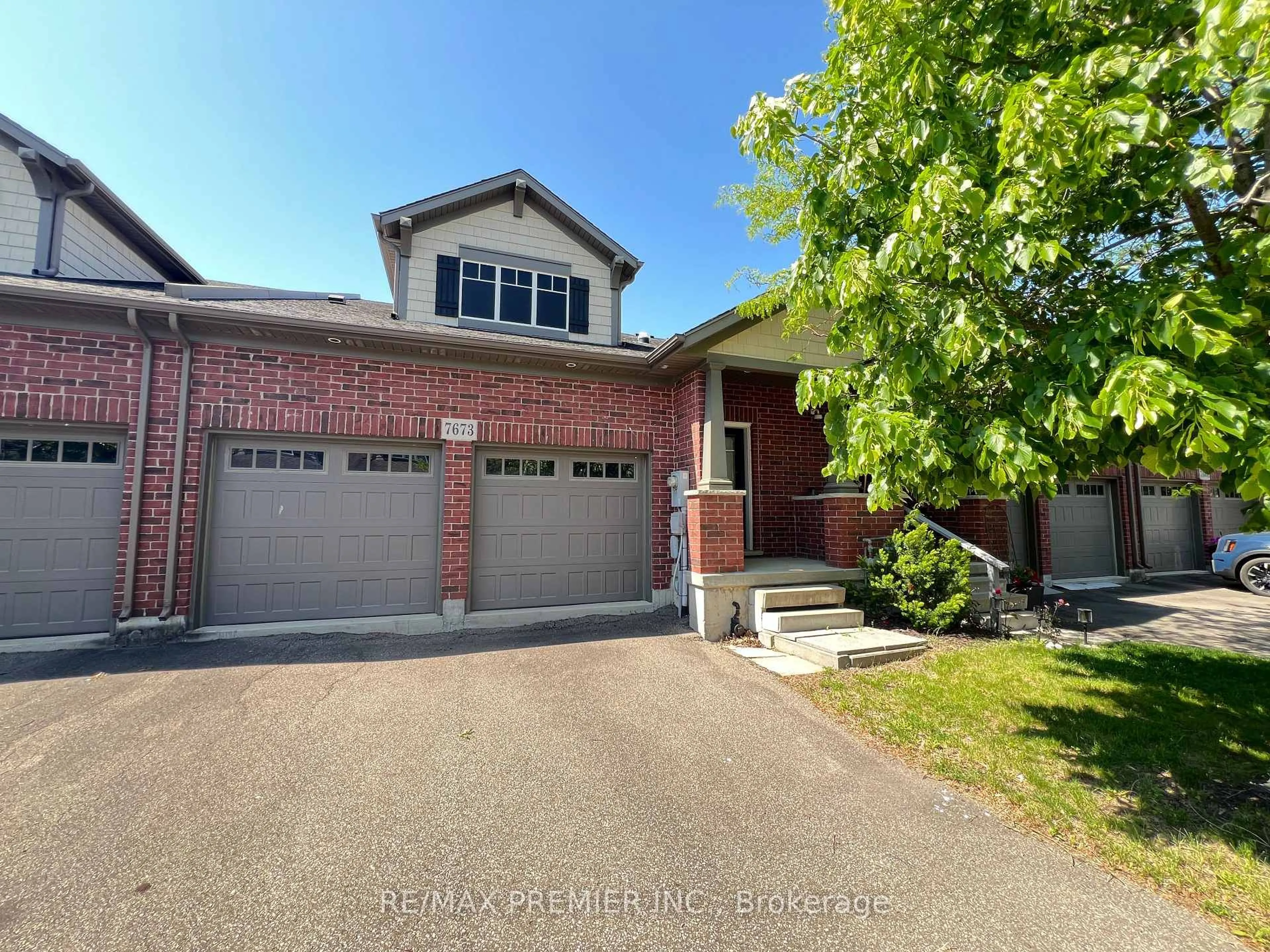 Home with brick exterior material, street for 7673 Green Vista Gate #140, Niagara Falls Ontario L2G 0A8