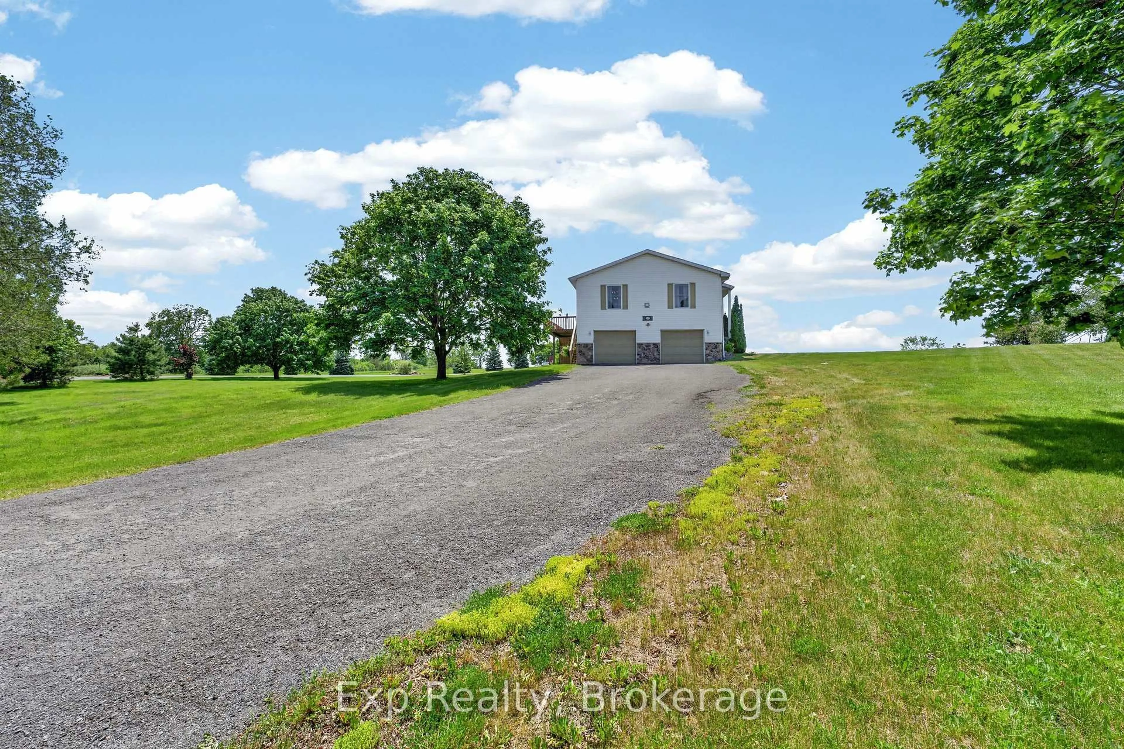 A pic from outside/outdoor area/front of a property/back of a property/a pic from drone, water/lake/river/ocean view for 1004 Village View Lane, Sydenham Ontario K0H 2T0