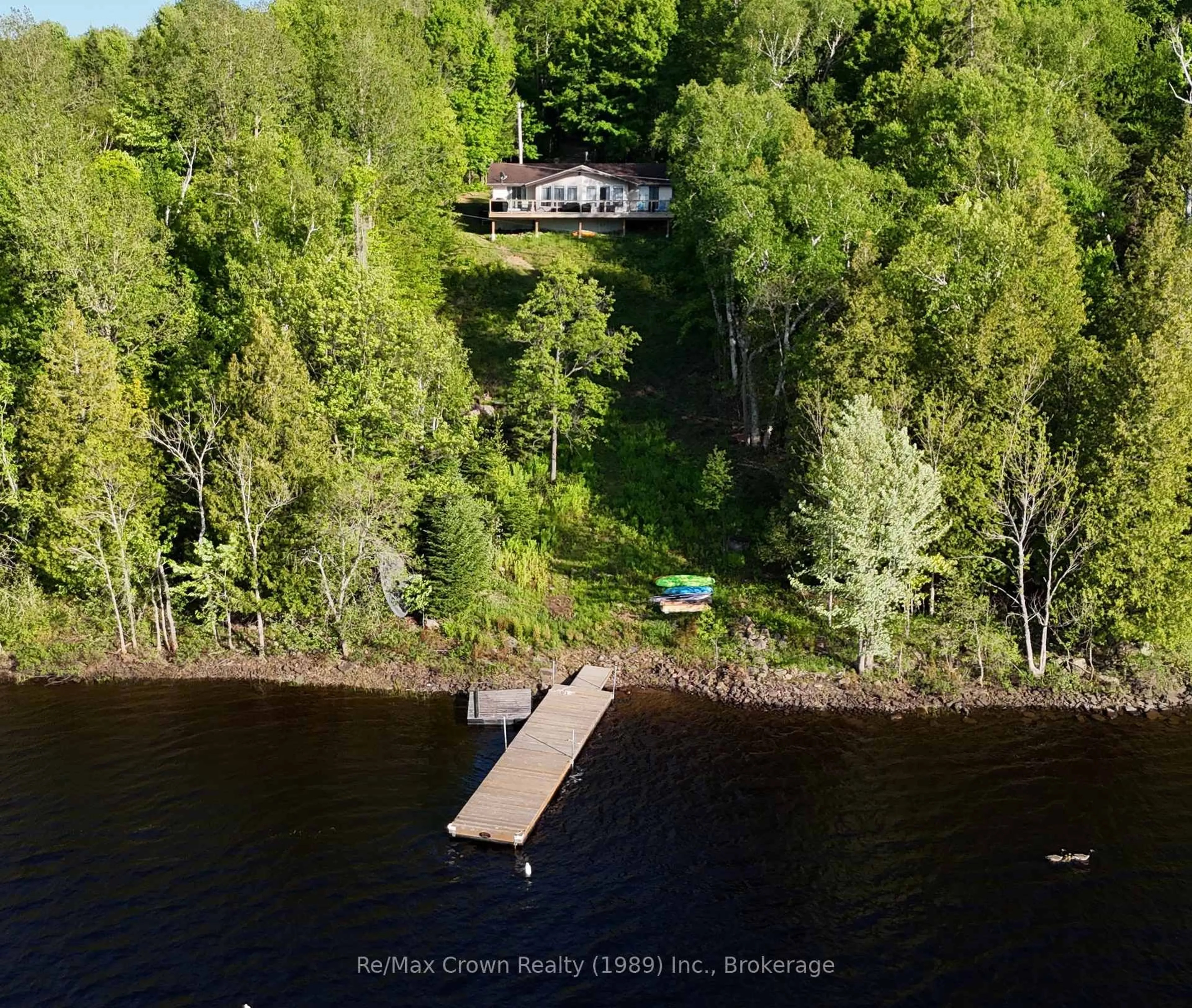 A pic from outside/outdoor area/front of a property/back of a property/a pic from drone, water/lake/river/ocean view for 581 Limberlost Point Rd, Parry Sound Remote Area Ontario P0H 2R0