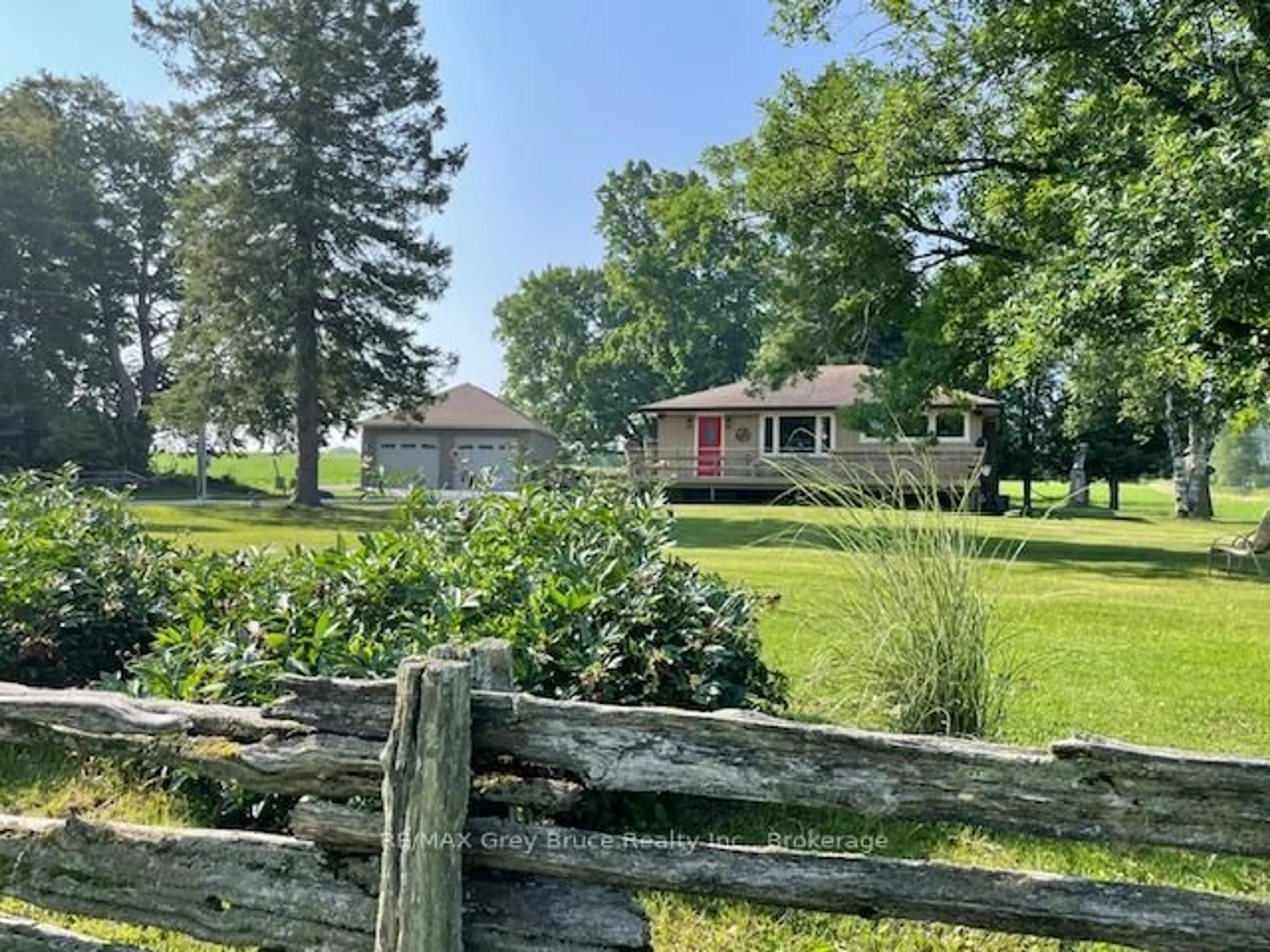A pic from outside/outdoor area/front of a property/back of a property/a pic from drone, water/lake/river/ocean view for 202306 6 Highway, Georgian Bluffs Ontario N4K 5N5
