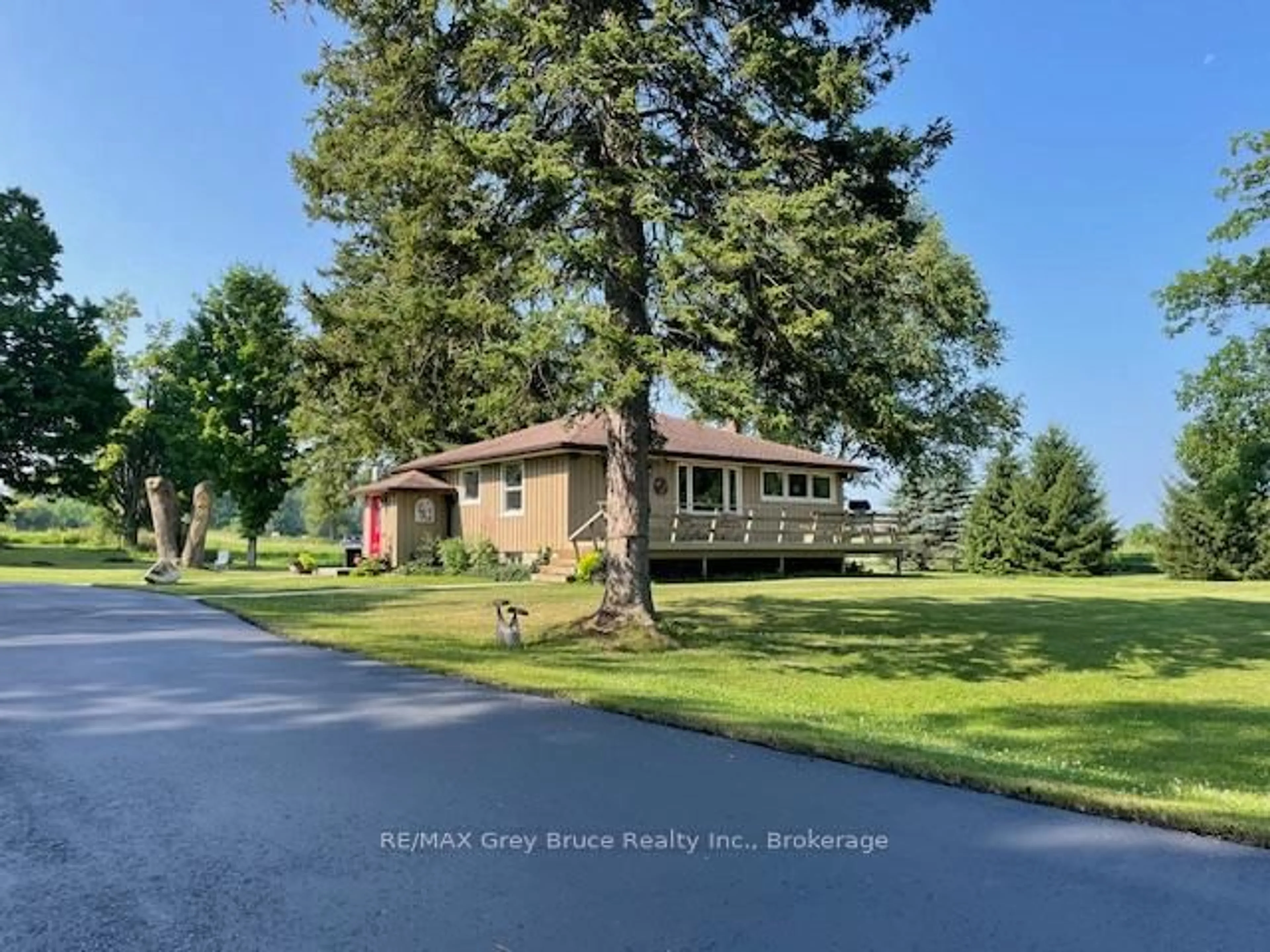 A pic from outside/outdoor area/front of a property/back of a property/a pic from drone, water/lake/river/ocean view for 202306 6 Highway, Georgian Bluffs Ontario N4K 5N5