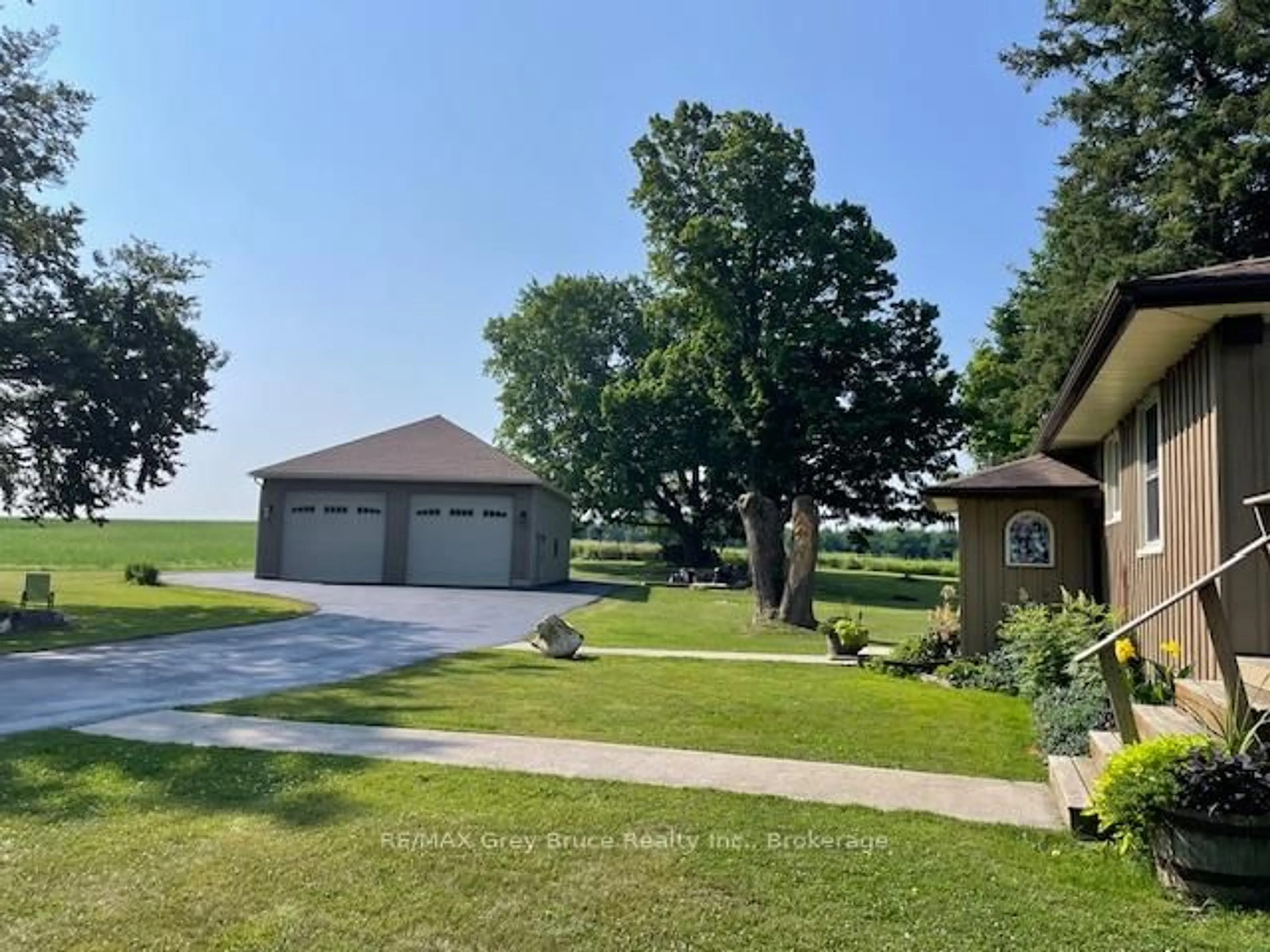 A pic from outside/outdoor area/front of a property/back of a property/a pic from drone, water/lake/river/ocean view for 202306 6 Highway, Georgian Bluffs Ontario N4K 5N5
