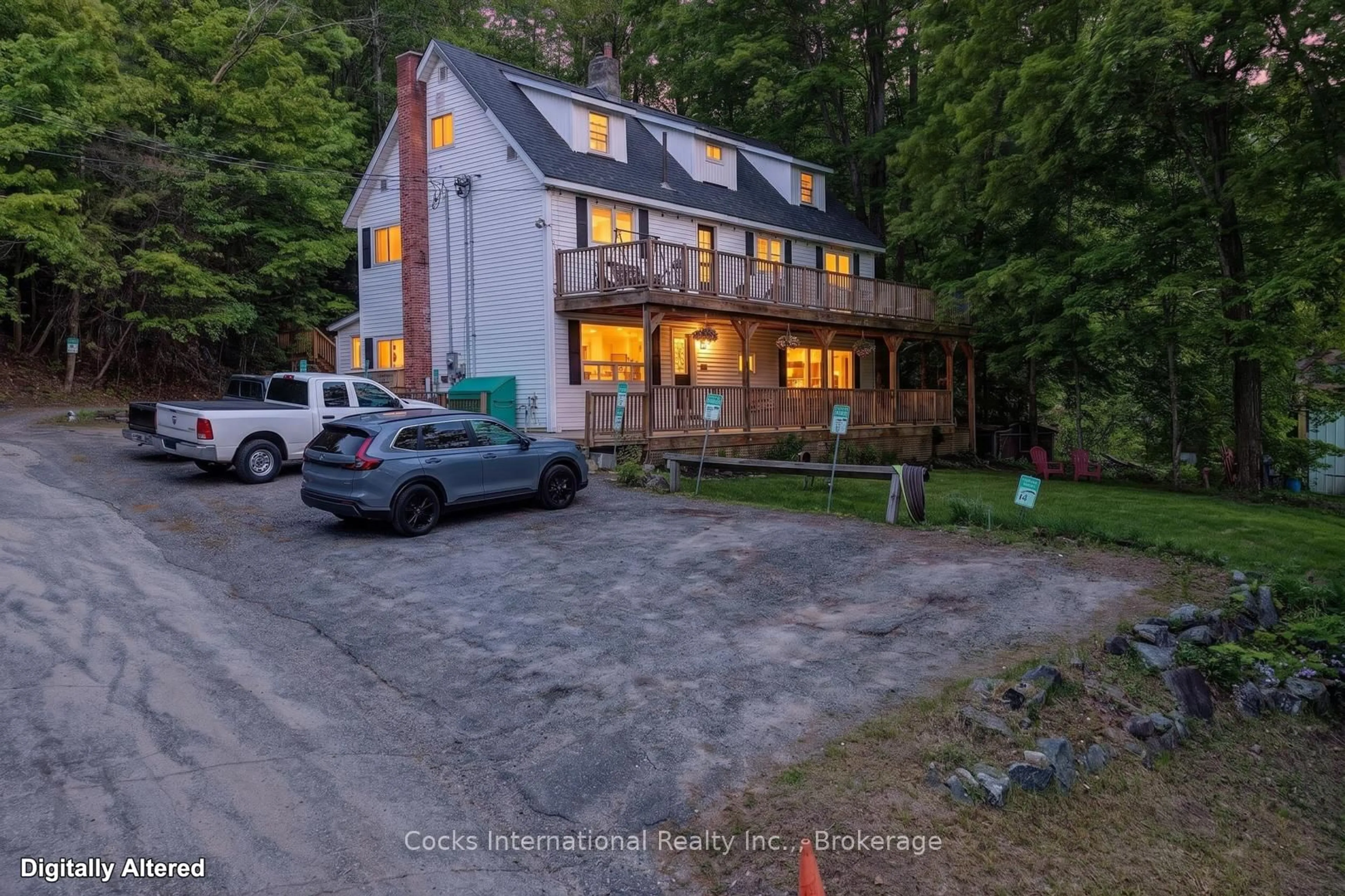 A pic from outside/outdoor area/front of a property/back of a property/a pic from drone, street for 755 Muskoka Road 10 Rd, Huntsville Ontario P0B 1L0