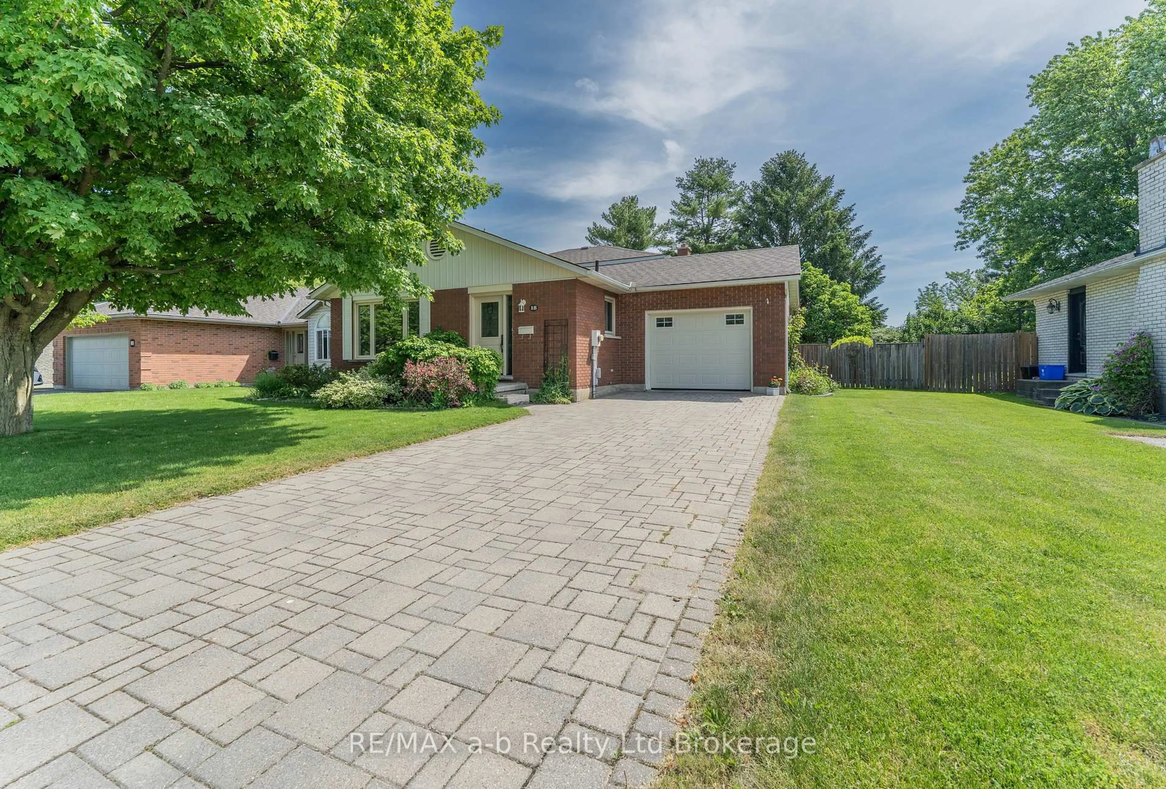 Home with brick exterior material, street for 18 Denrich Ave, Tillsonburg Ontario N4G 4W2