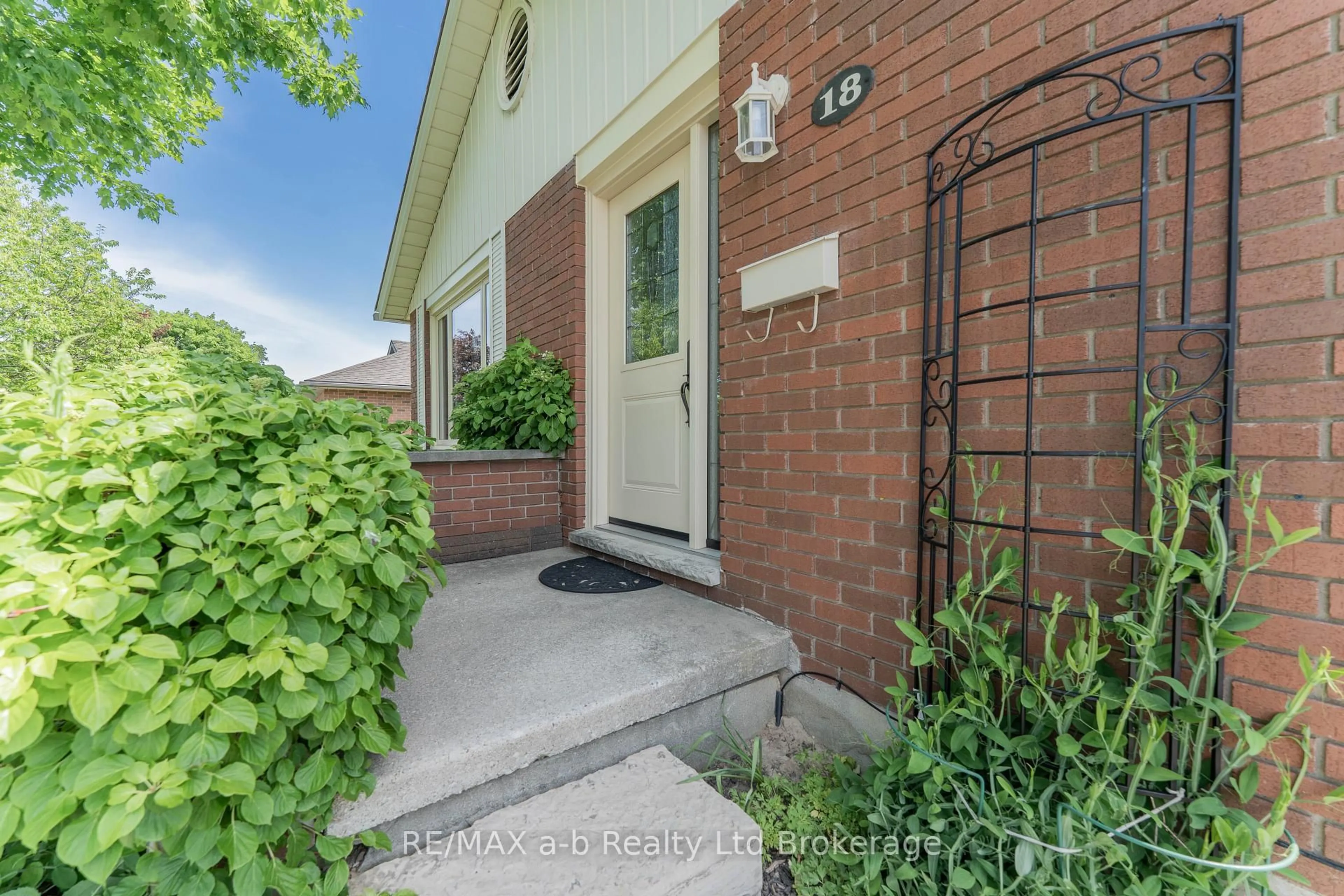 Home with brick exterior material, street for 18 Denrich Ave, Tillsonburg Ontario N4G 4W2