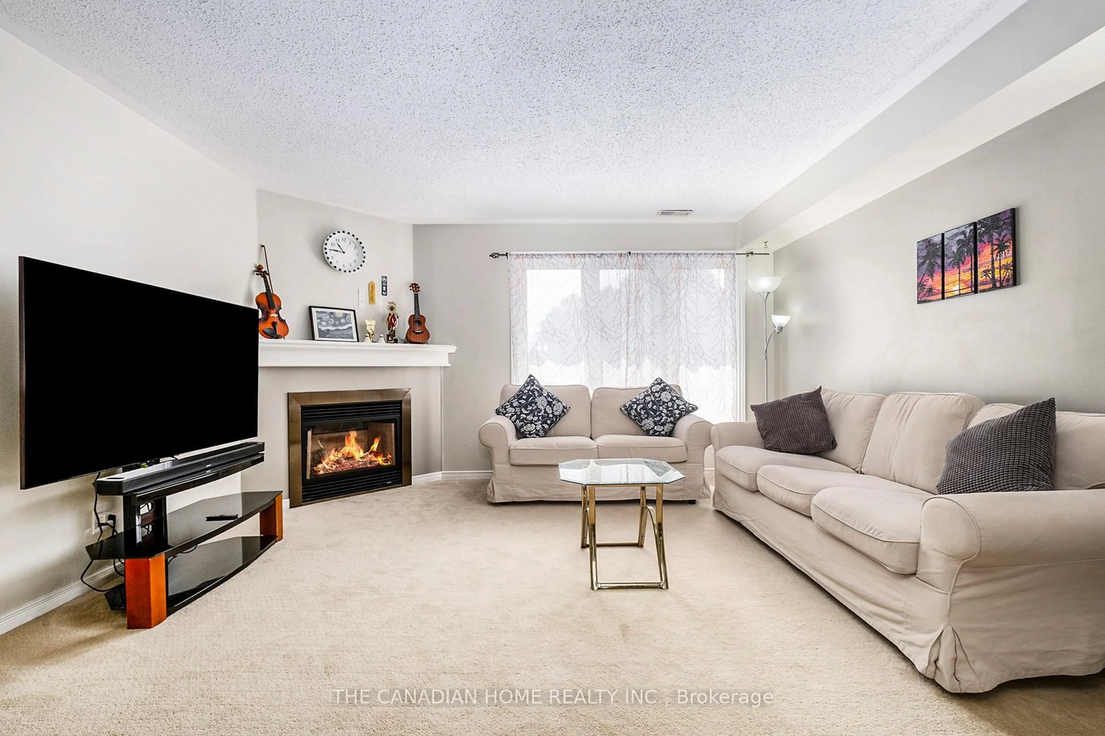 Living room with furniture, unknown for 1672 Locksley Lane #27, Ottawa Ontario K1J 1B6