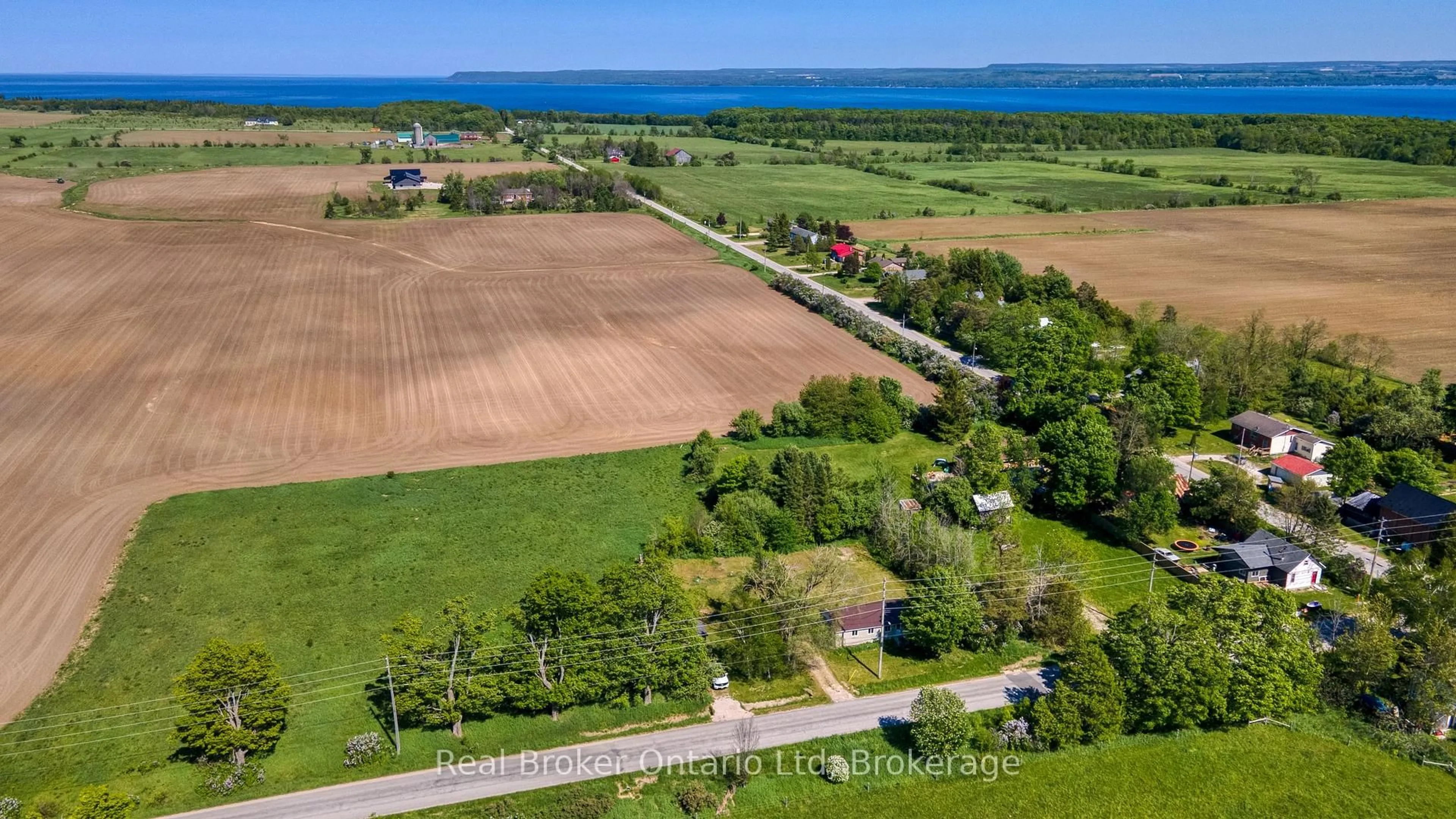 A pic from outside/outdoor area/front of a property/back of a property/a pic from drone, water/lake/river/ocean view for 310009 Kemble Rock Rd, Georgian Bluffs Ontario N0H 1S0