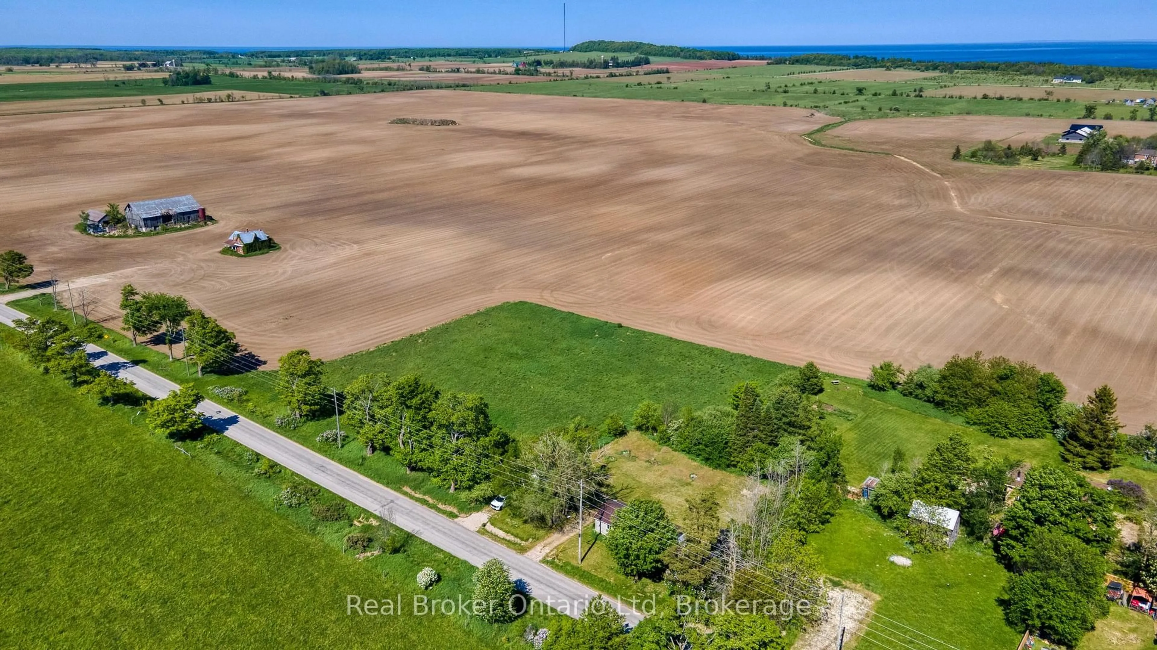 A pic from outside/outdoor area/front of a property/back of a property/a pic from drone, water/lake/river/ocean view for 310009 Kemble Rock Rd, Georgian Bluffs Ontario N0H 1S0
