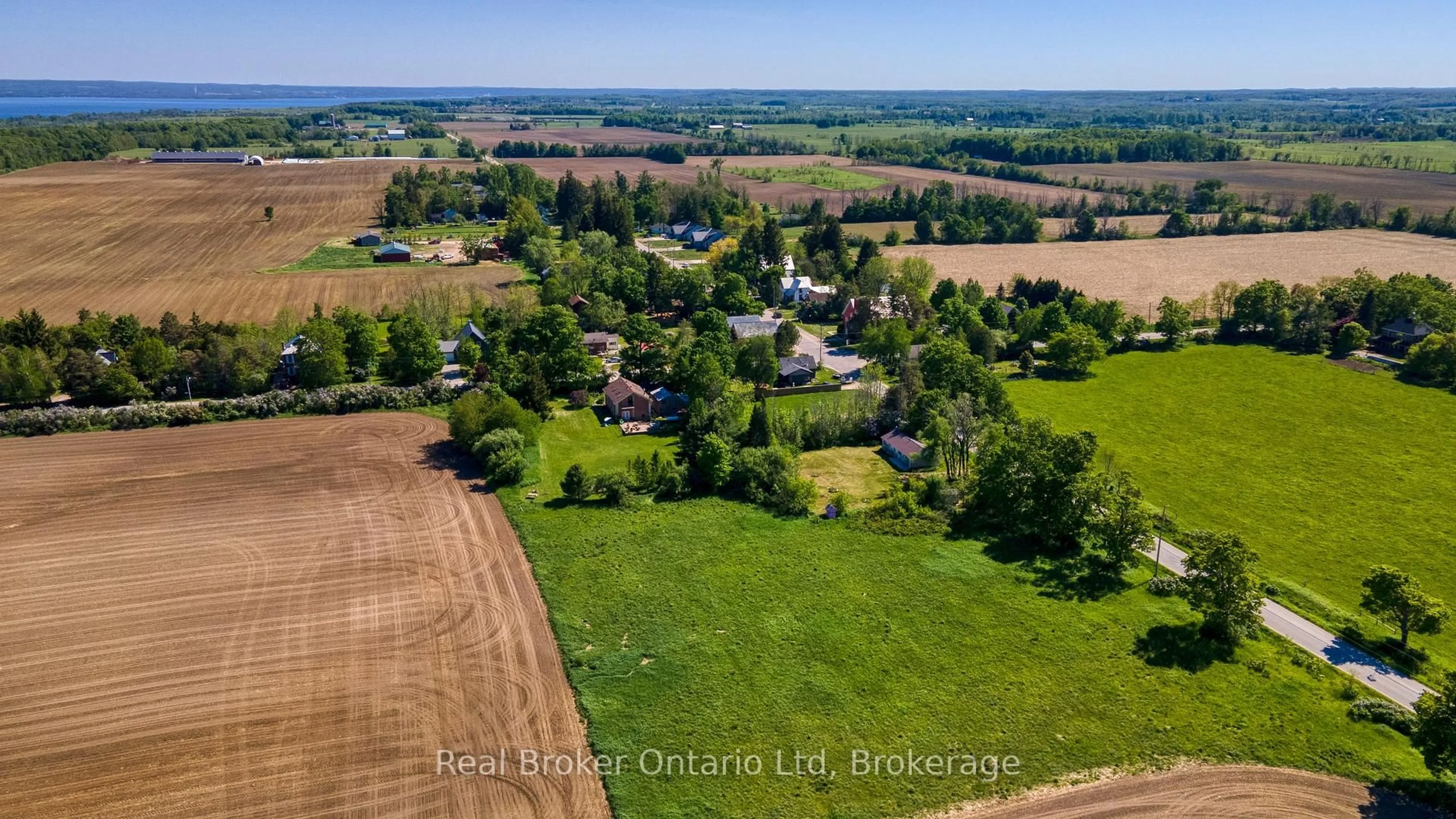 A pic from outside/outdoor area/front of a property/back of a property/a pic from drone, unknown for 310009 Kemble Rock Rd, Georgian Bluffs Ontario N0H 1S0