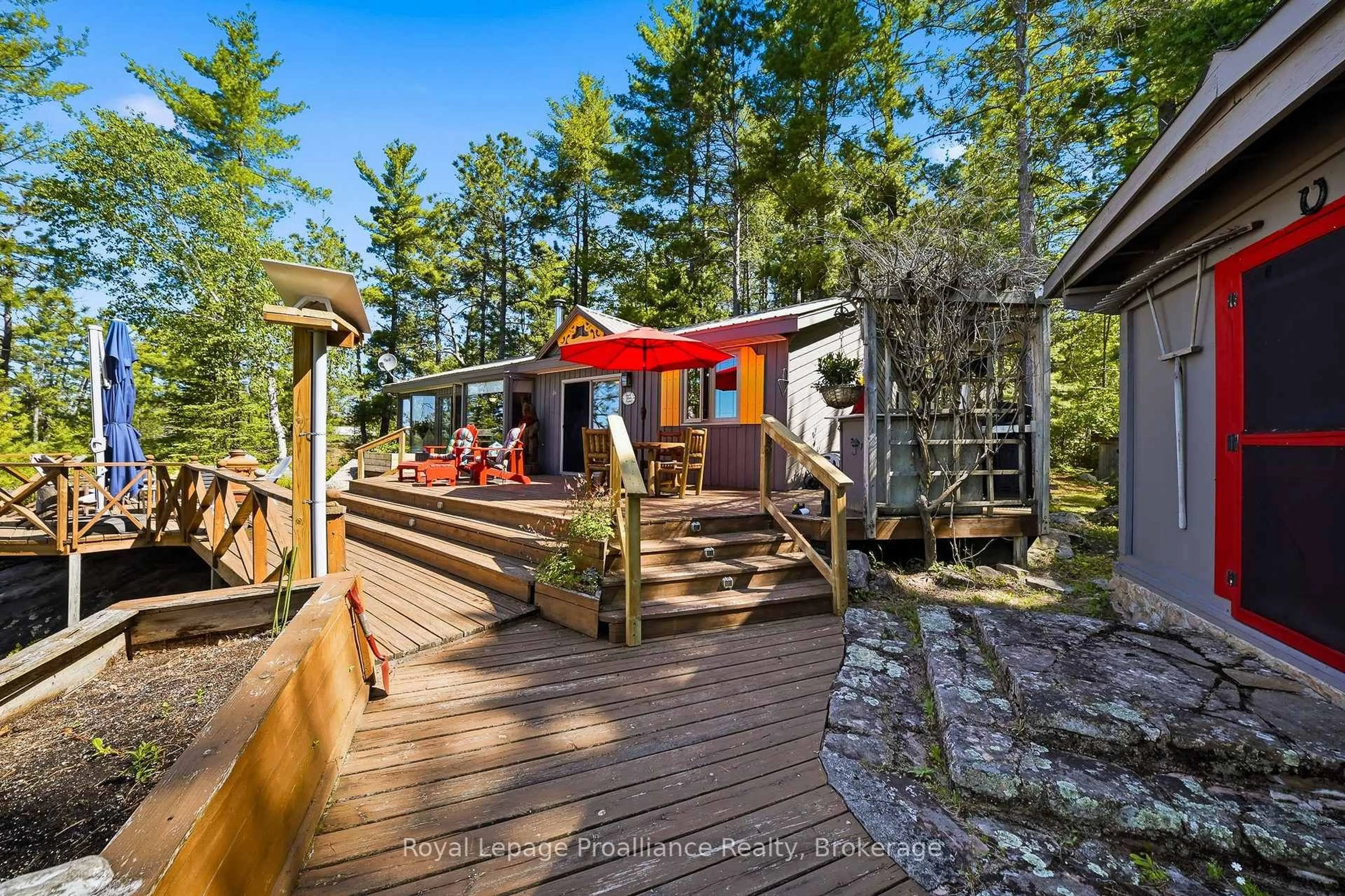 Patio, forest/trees view for 890 Mazinaw Lake, Cloyne Ontario K0H 1K0