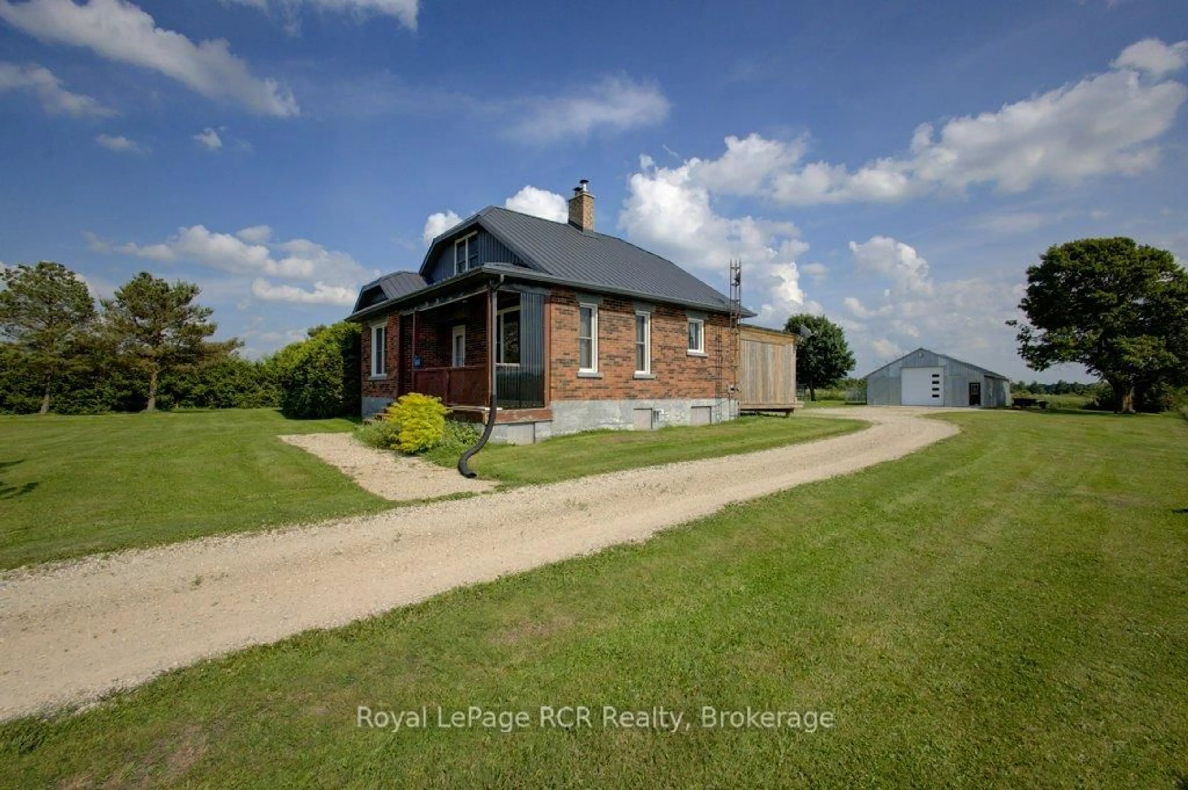A pic from outside/outdoor area/front of a property/back of a property/a pic from drone, building for 8321 89 Highway, Wellington North Ontario N0G 1N0