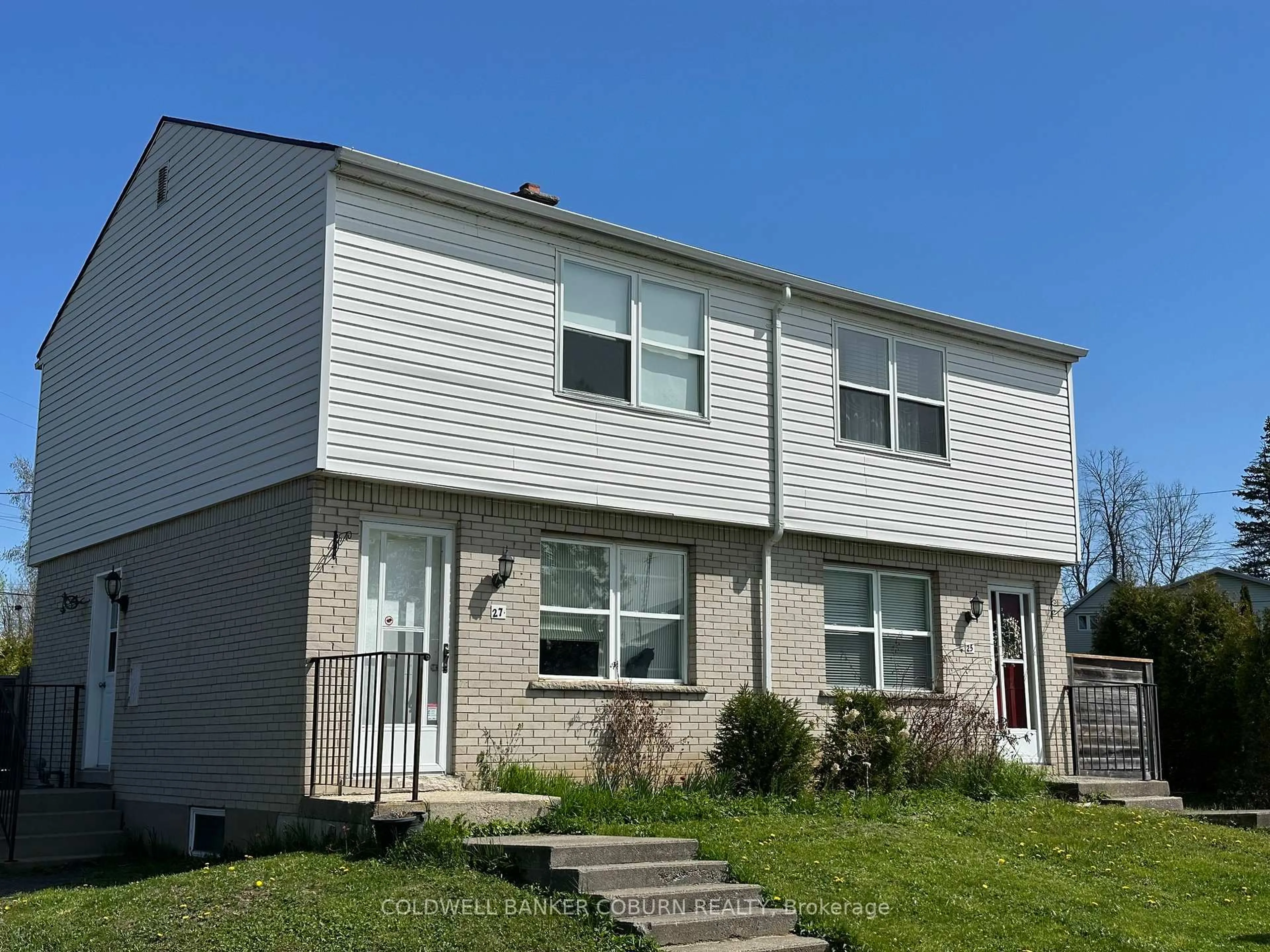 Home with vinyl exterior material, street for 25-27 Casselman Rd, South Dundas Ontario K0C 1X0