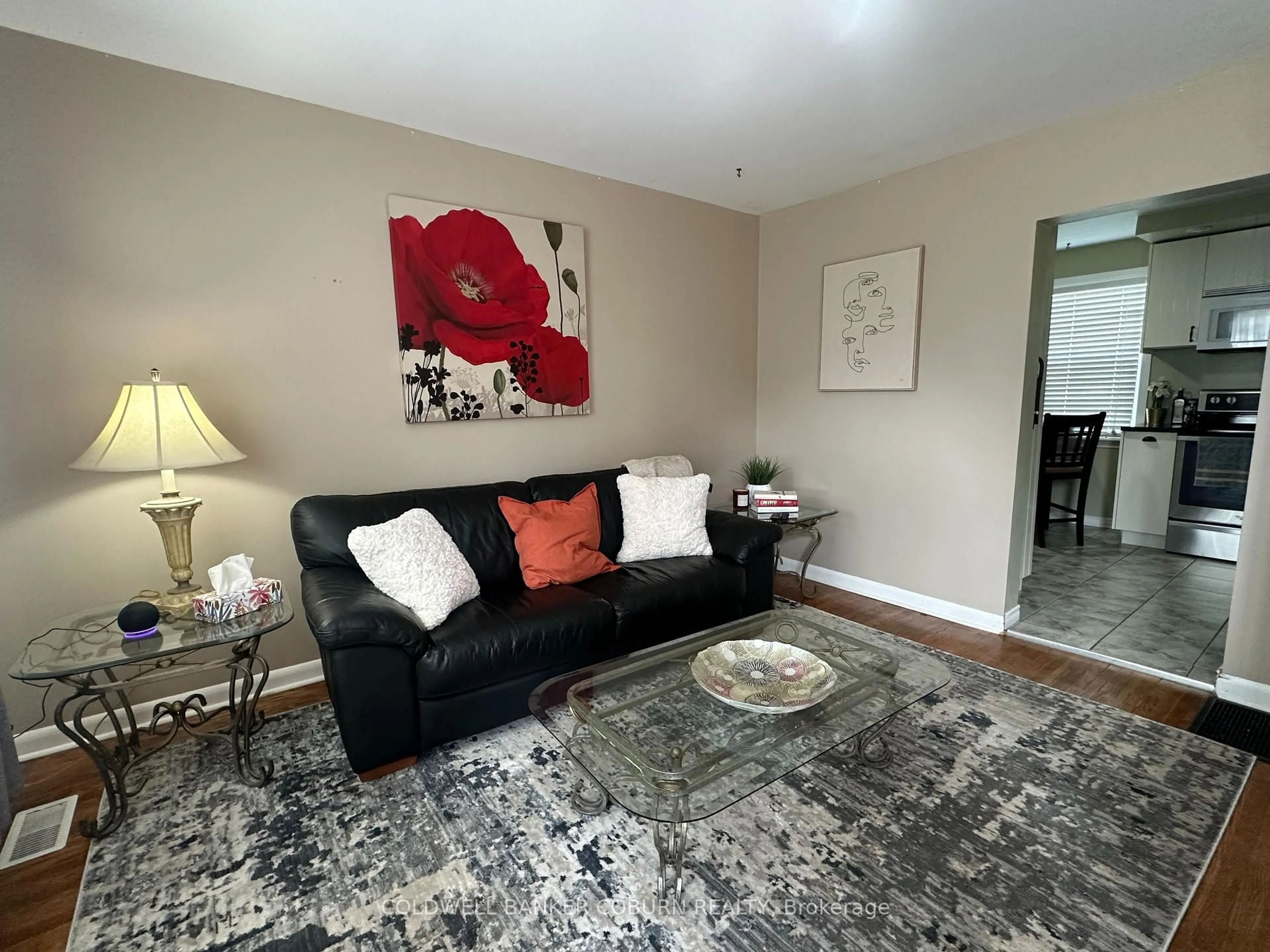 Living room with furniture, carpet floor for 25-27 Casselman Rd, South Dundas Ontario K0C 1X0