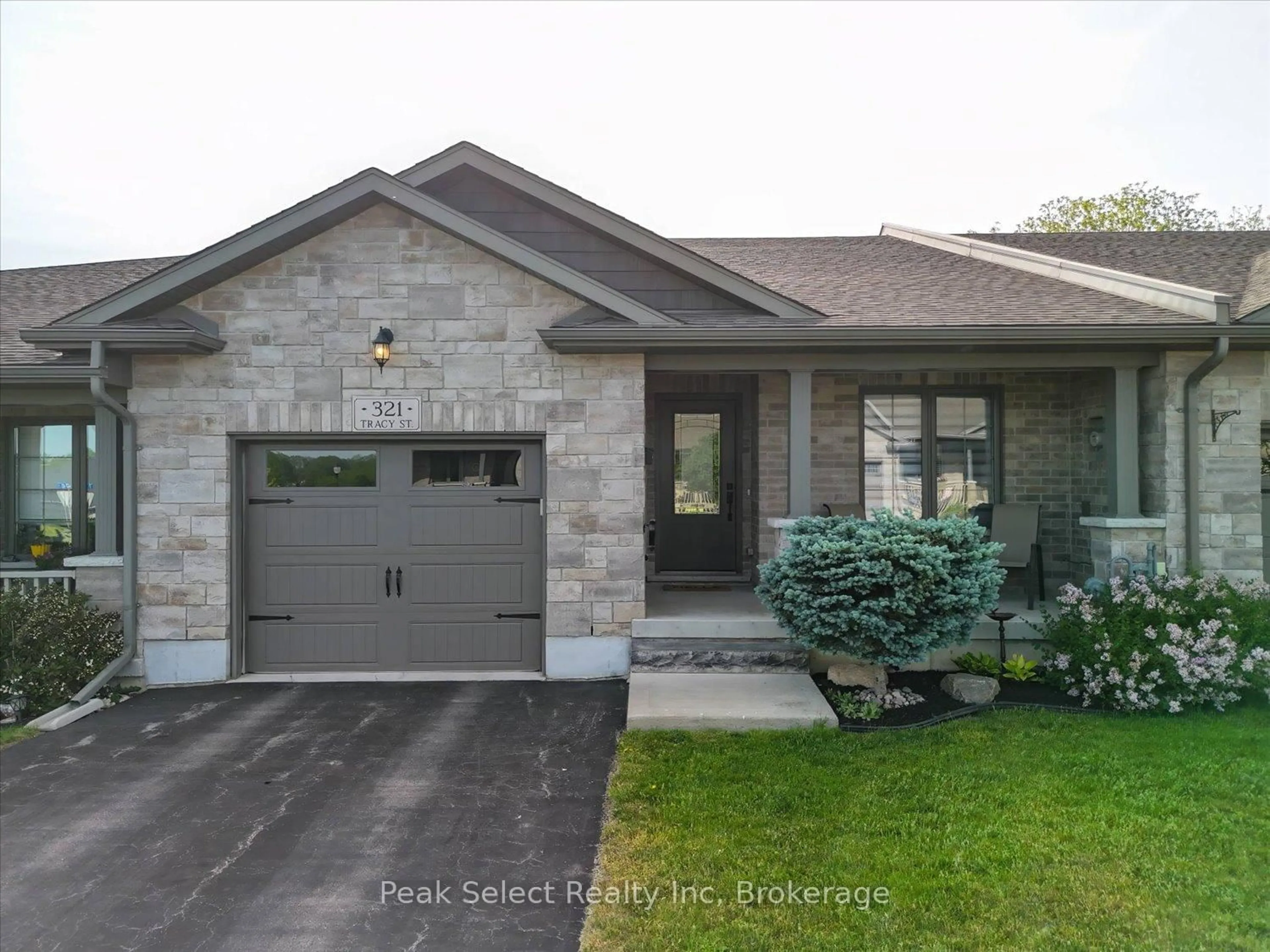 Home with brick exterior material, street for 321 Tracy St, St. Marys Ontario N4X 0B4