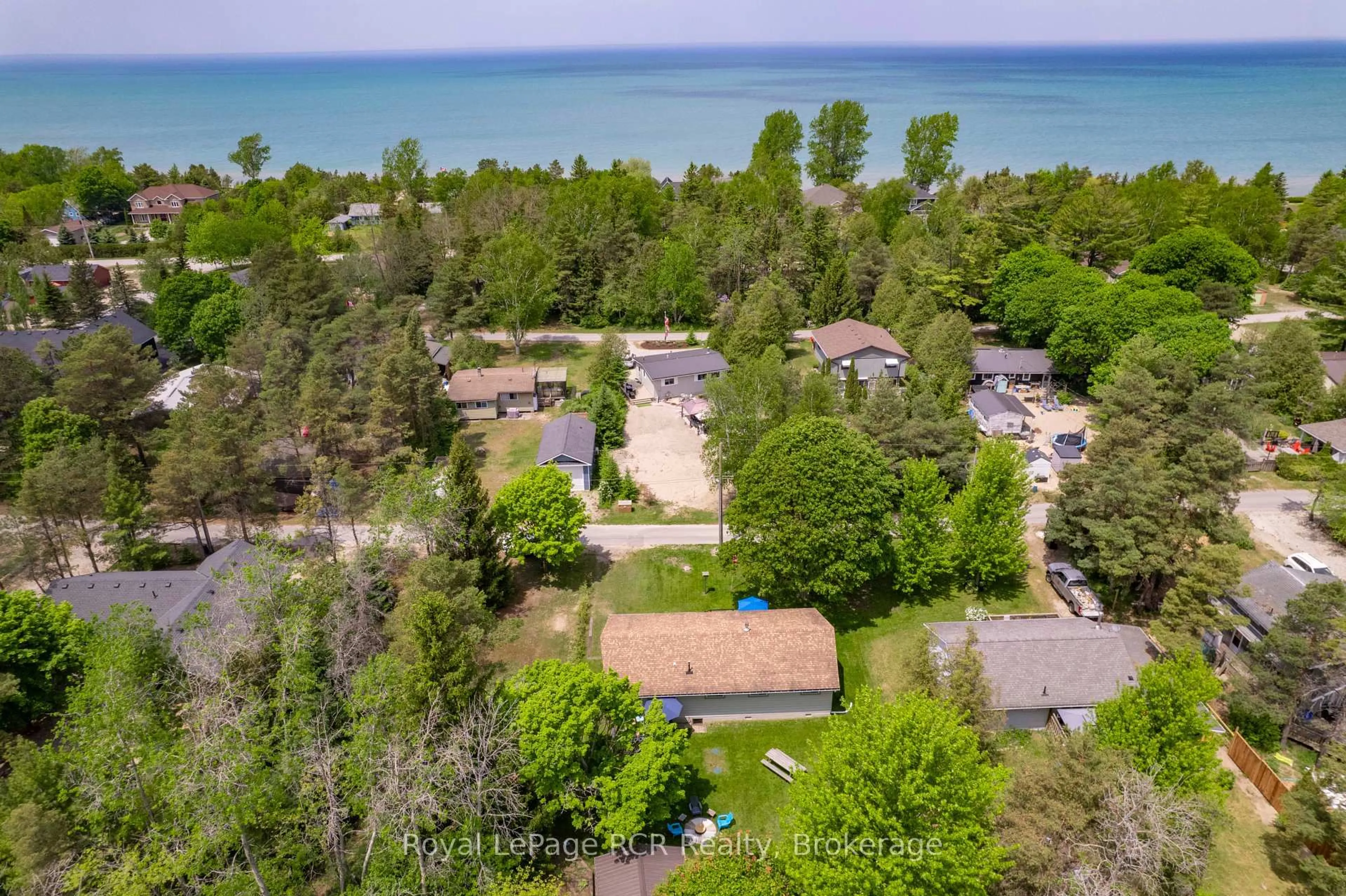 A pic from outside/outdoor area/front of a property/back of a property/a pic from drone, water/lake/river/ocean view for 69 Smith Lane, Huron-Kinloss Ontario N0G 2R0