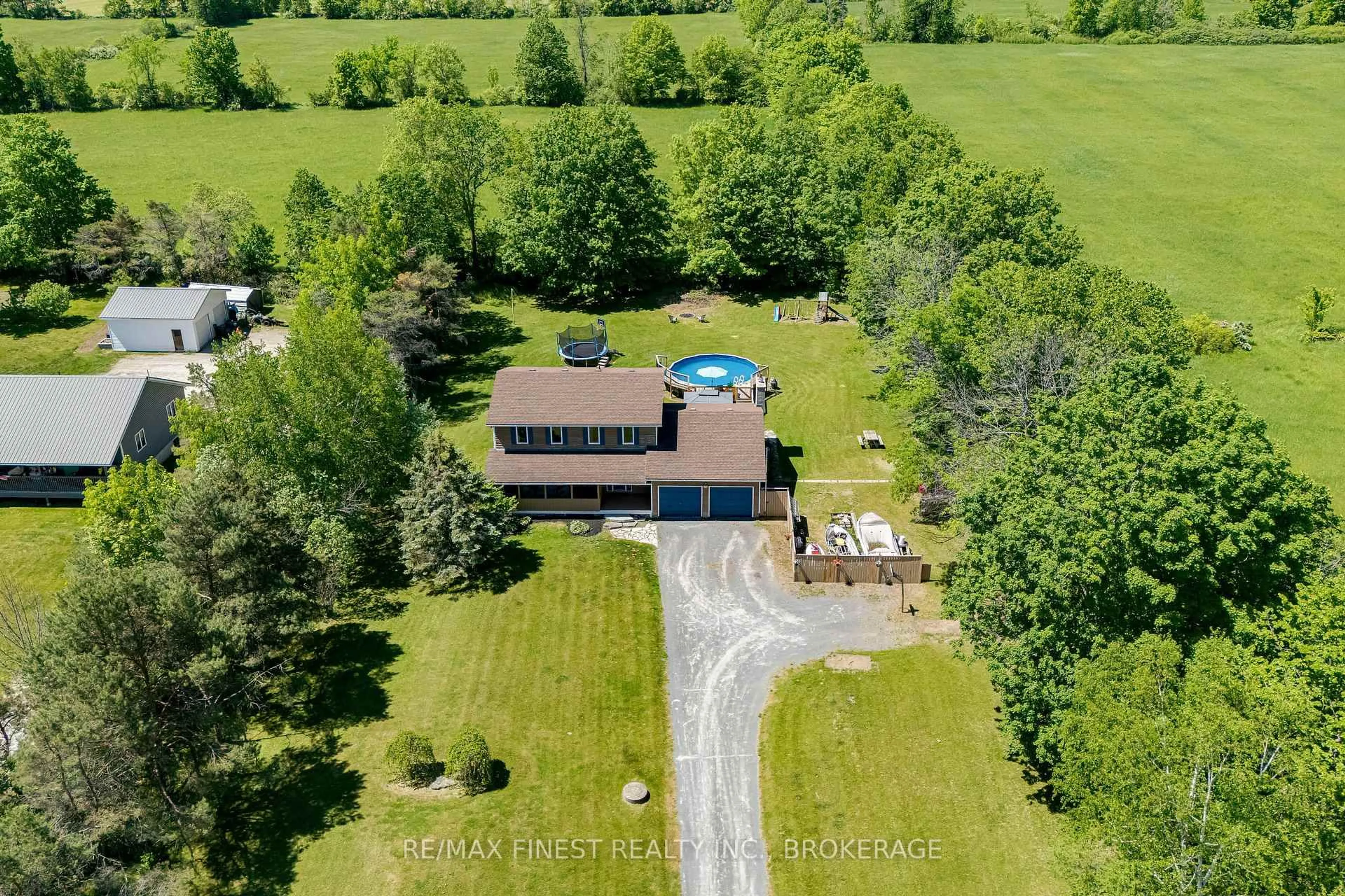 A pic from outside/outdoor area/front of a property/back of a property/a pic from drone, water/lake/river/ocean view for 142 County Road 15, Tamworth Ontario K0K 3G0