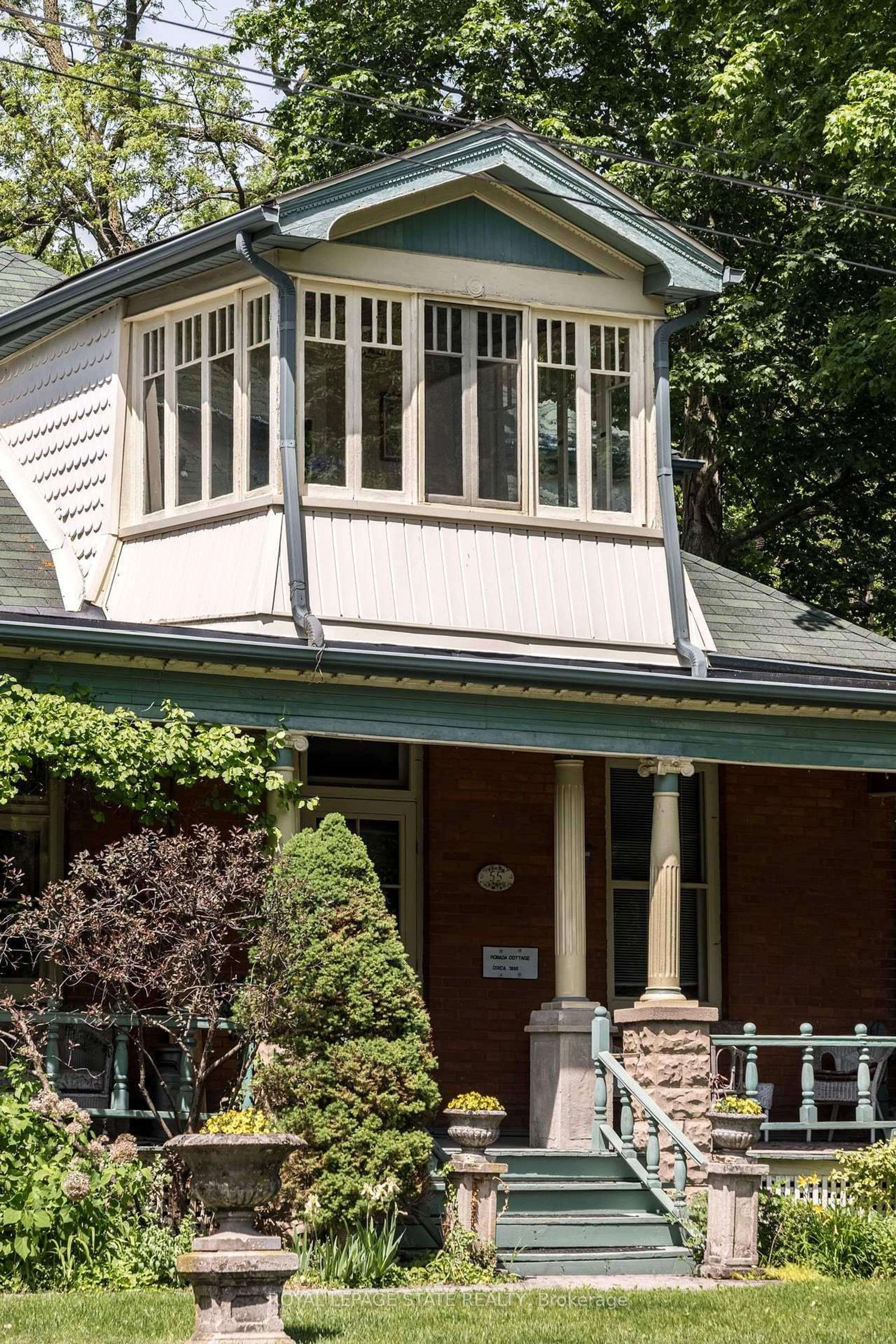 Home with vinyl exterior material, street for 55 Cayley St, Hamilton Ontario L9H 2E6