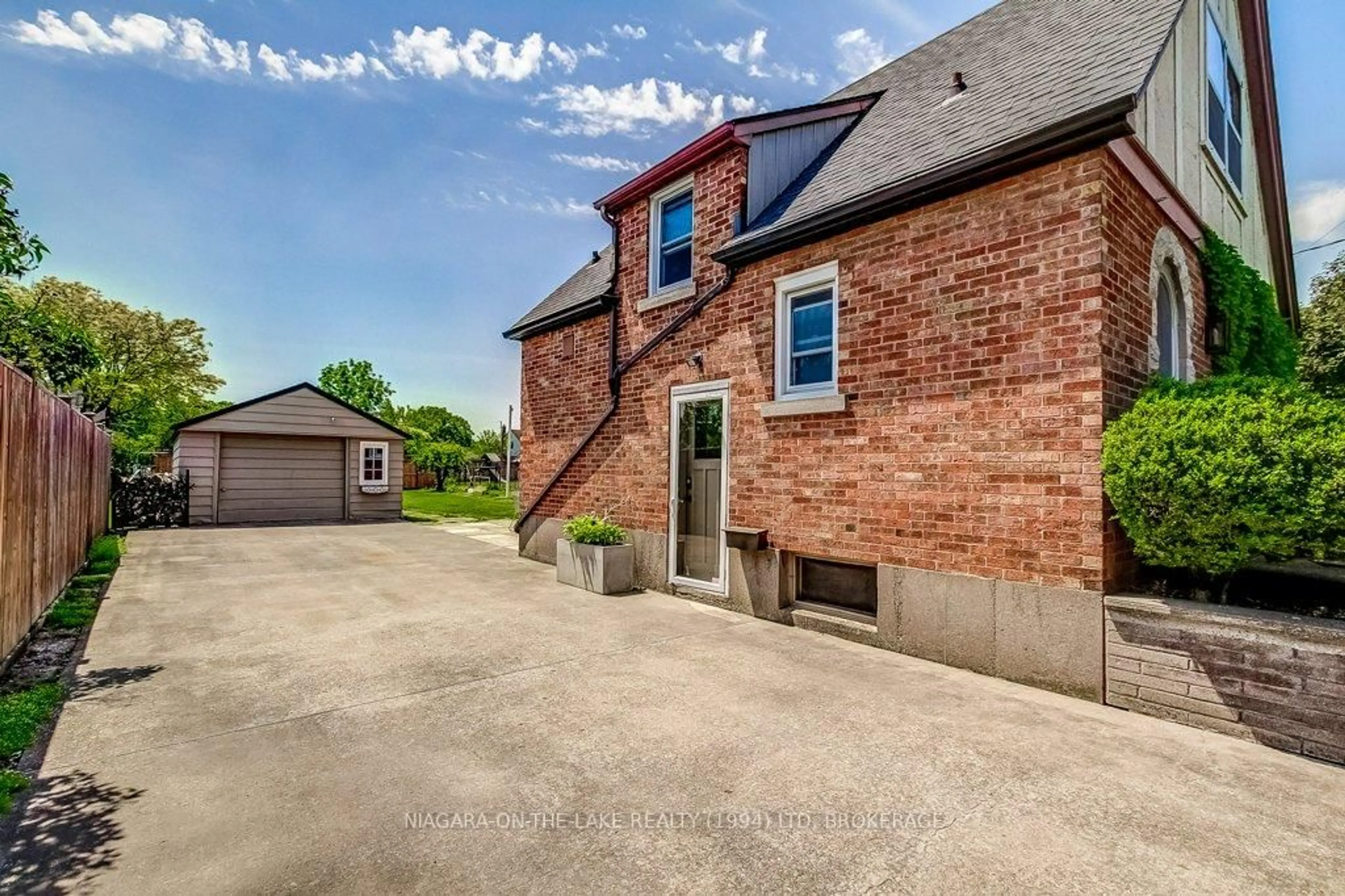 Home with brick exterior material, street for 2 Vivian Ave, St. Catharines Ontario L2M 5X7