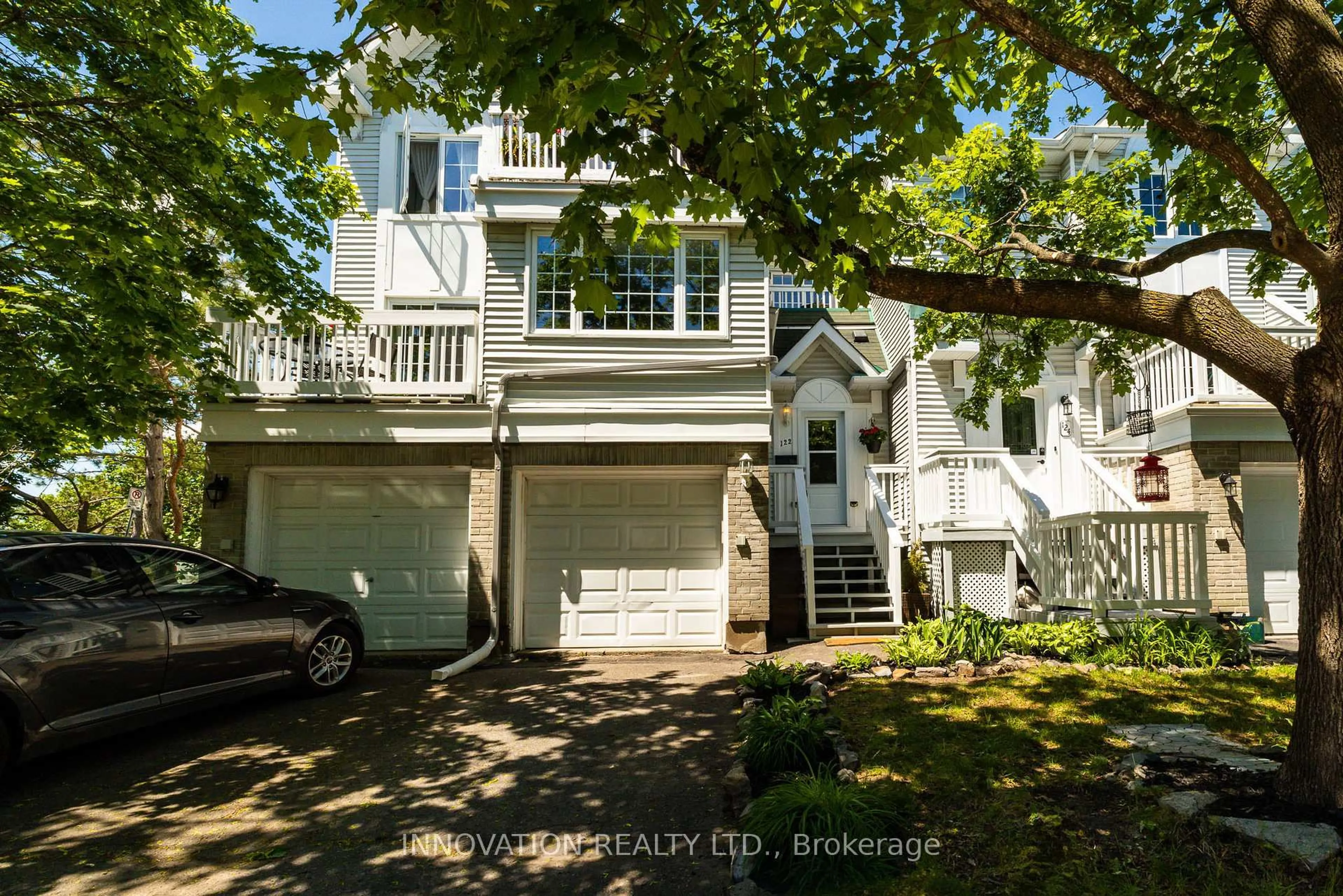 A pic from outside/outdoor area/front of a property/back of a property/a pic from drone, street for 122 Castlegreen Private #58, Ottawa Ontario K1T 3N2