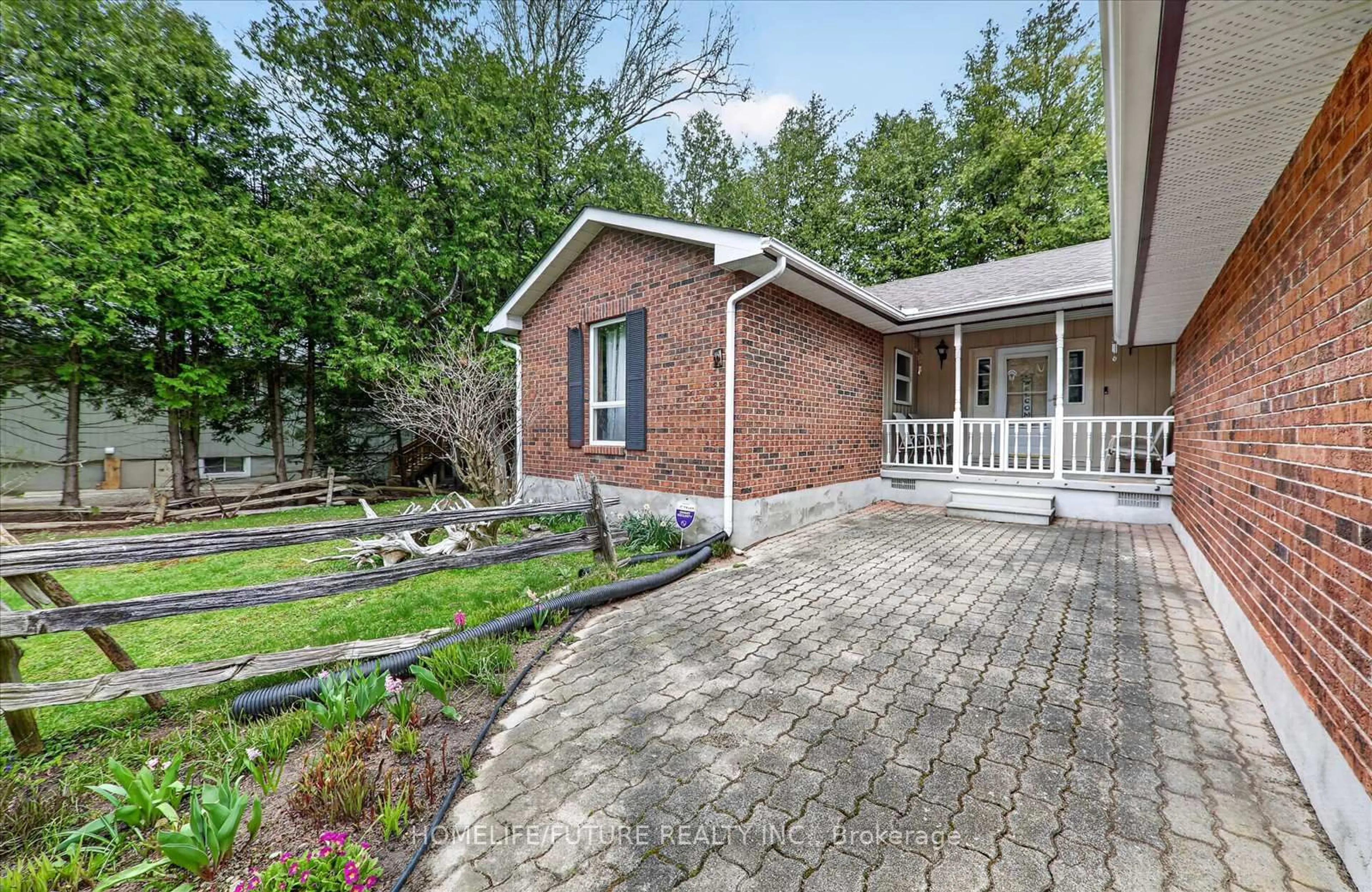 Home with brick exterior material, street for 137 Woodland Park Rd, Blue Mountains Ontario N0H 1J0