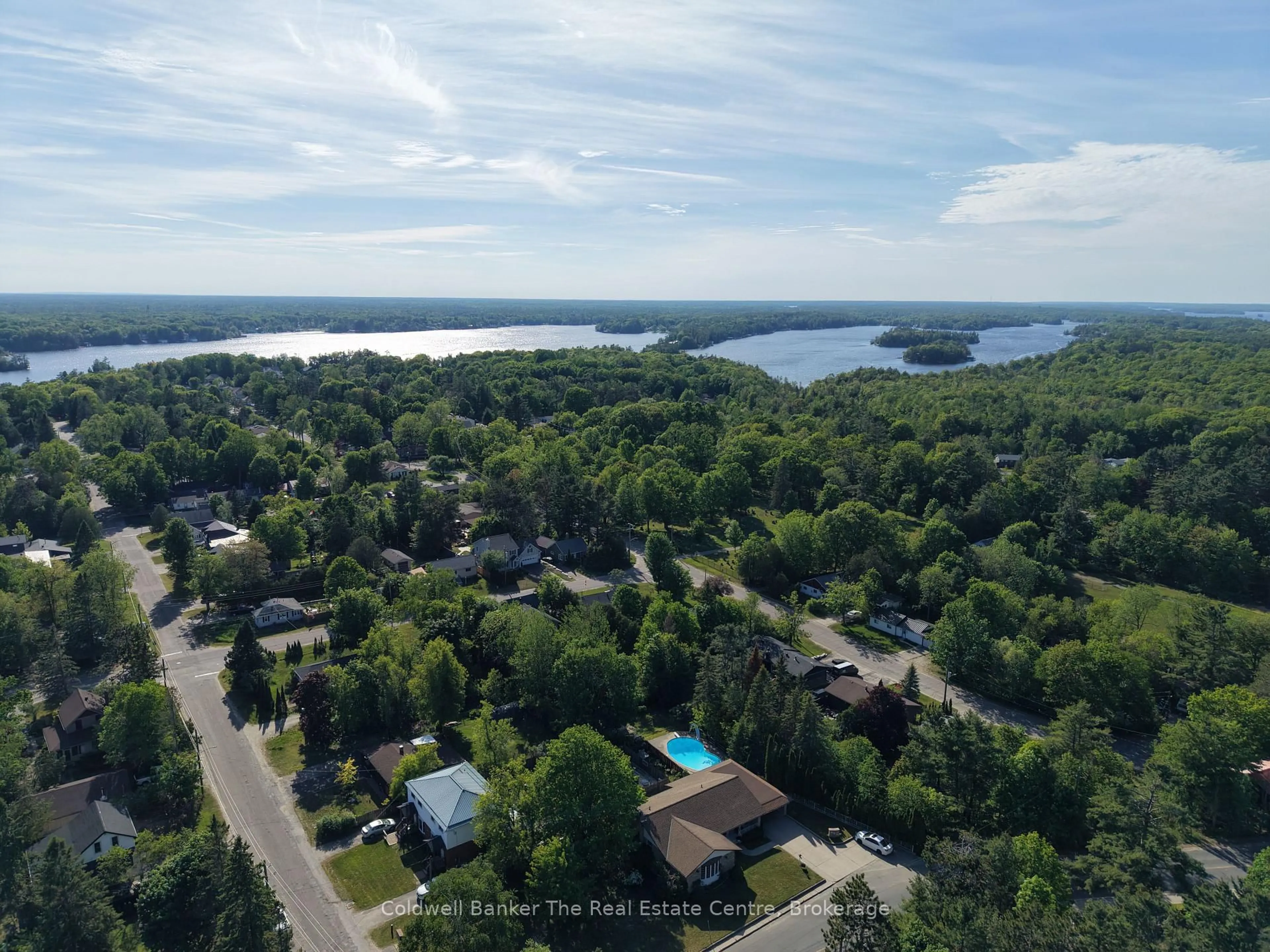 A pic from outside/outdoor area/front of a property/back of a property/a pic from drone, water/lake/river/ocean view for 815 Muskoka Rd, Gravenhurst Ontario P1P 1C2