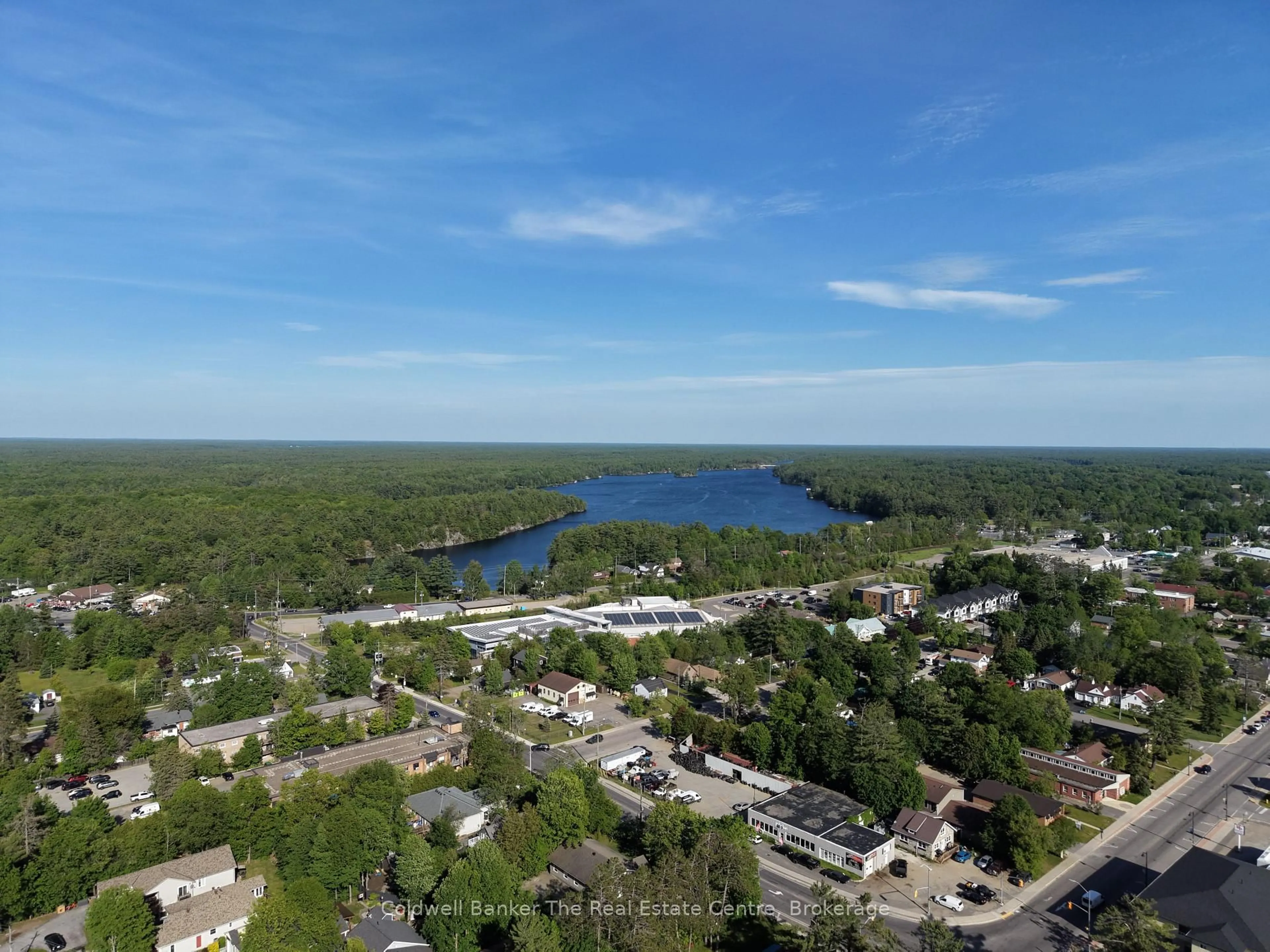 A pic from outside/outdoor area/front of a property/back of a property/a pic from drone, water/lake/river/ocean view for 815 Muskoka Rd, Gravenhurst Ontario P1P 1C2