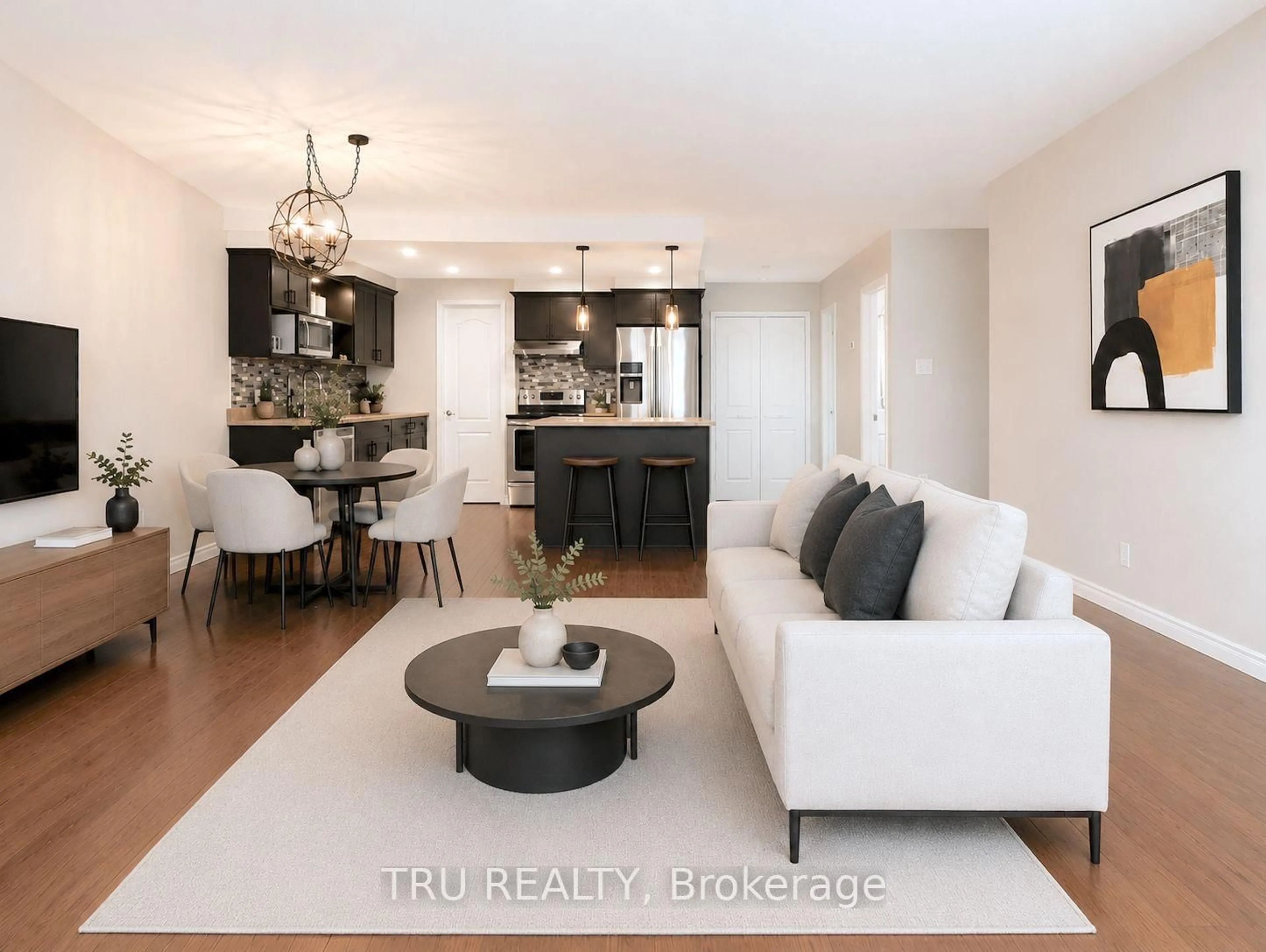 Living room with furniture, wood/laminate floor for 2315 Laval St, Clarence-Rockland Ontario K0A 1E0