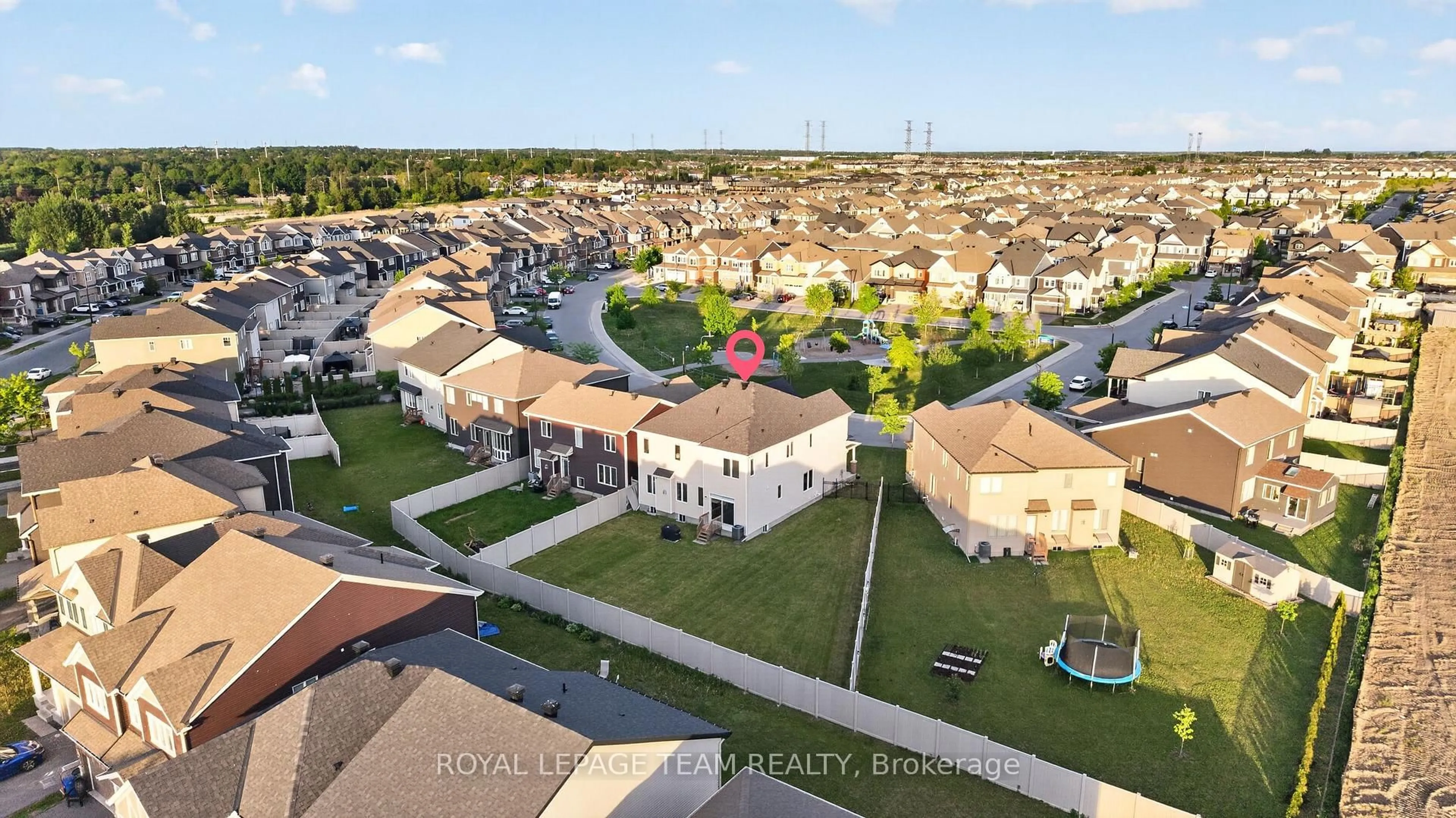 A pic from outside/outdoor area/front of a property/back of a property/a pic from drone, unknown for 290 Ponderosa St, Ottawa Ontario K2V 0N4