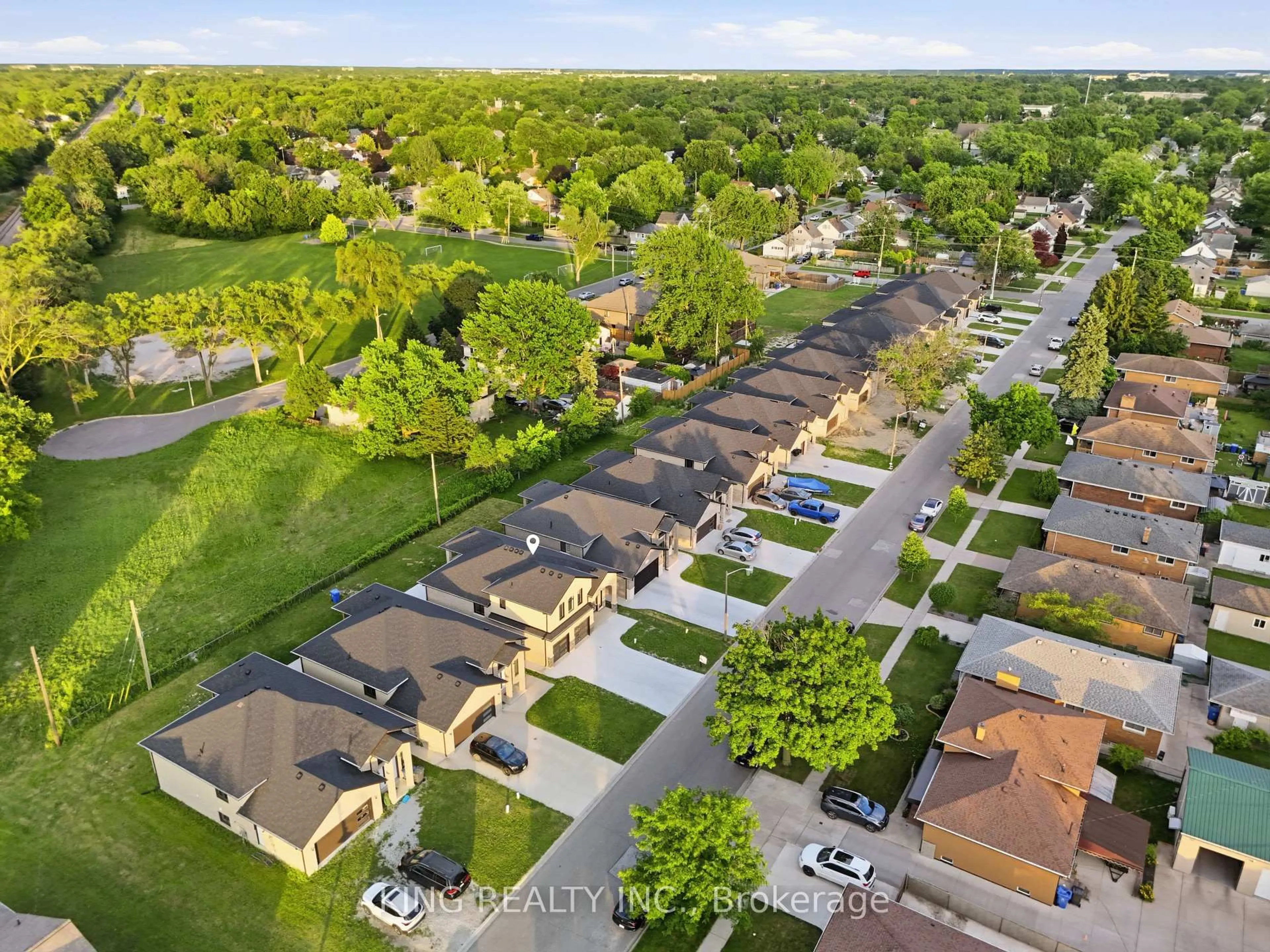 A pic from outside/outdoor area/front of a property/back of a property/a pic from drone, street for 1224 Tourangeau Rd, Windsor Ontario N8Y 0B2