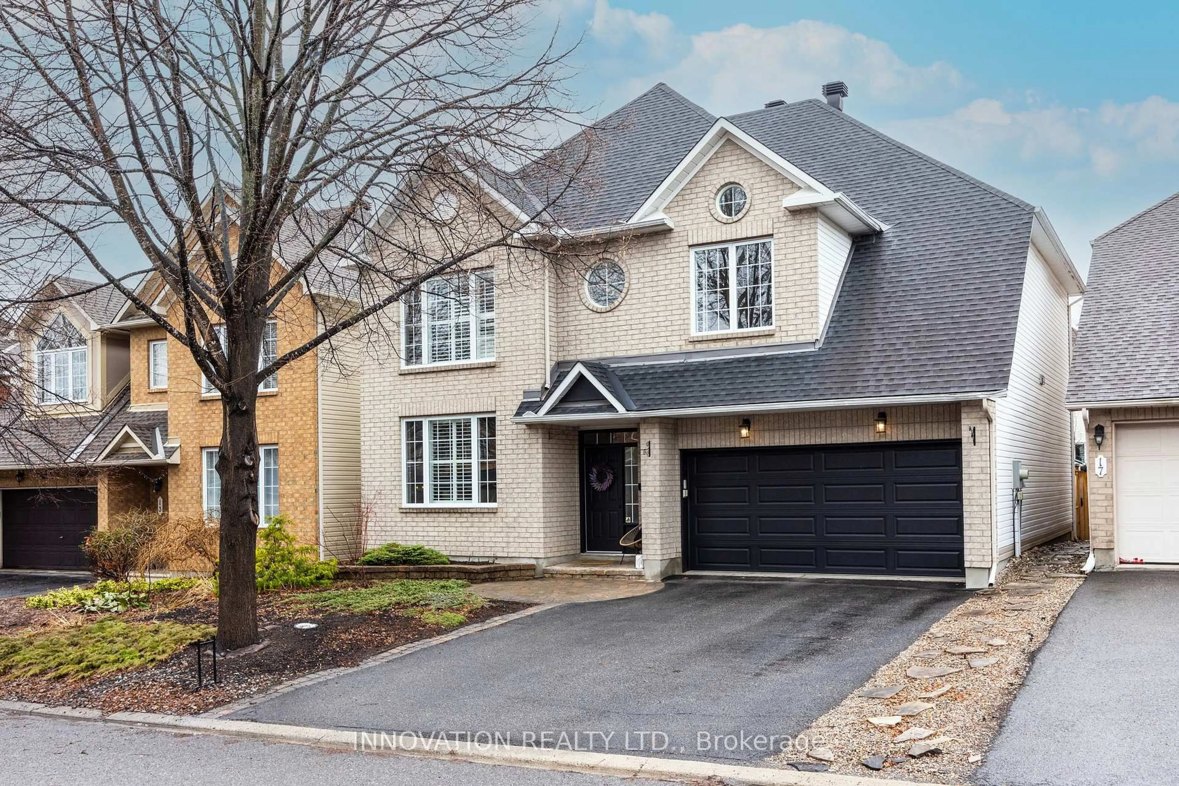 Home with brick exterior material, street for 15 Whithorn Ave, Kanata Ontario K2K 3B2