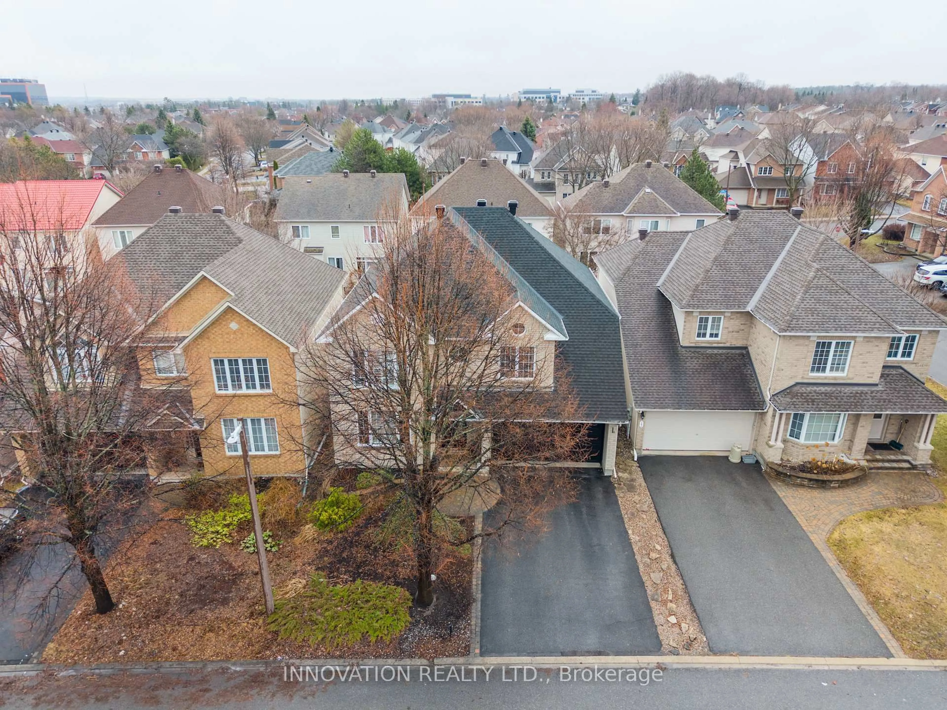A pic from outside/outdoor area/front of a property/back of a property/a pic from drone, street for 15 Whithorn Ave, Kanata Ontario K2K 3B2