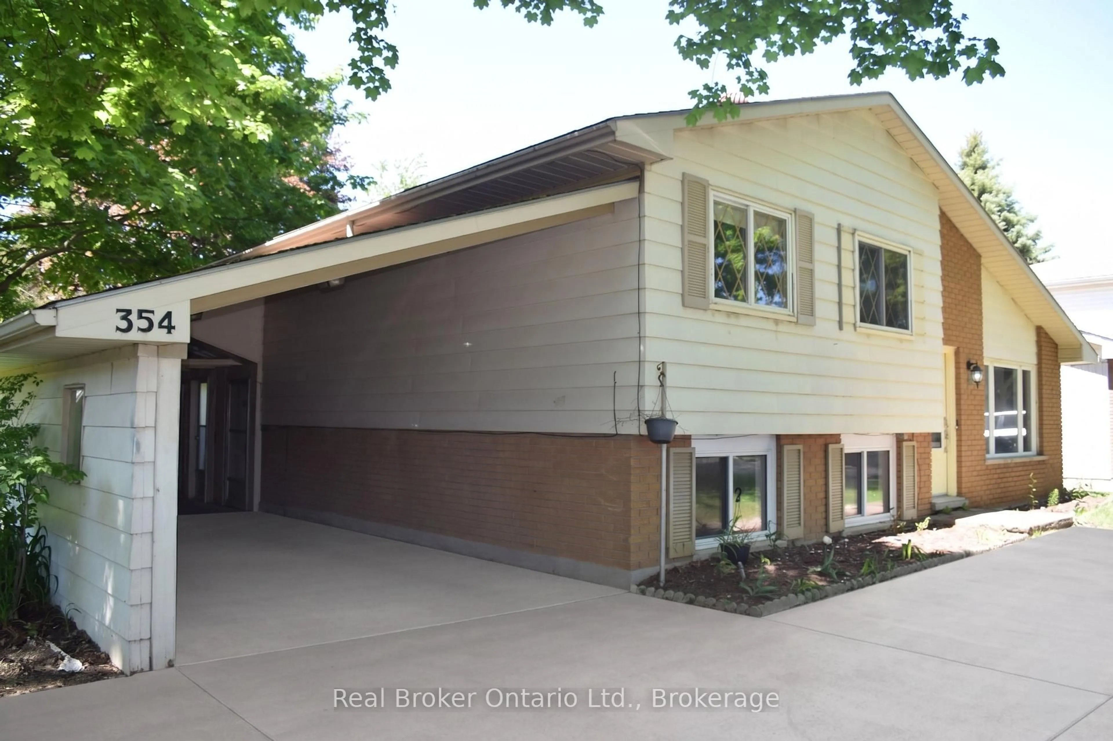 Home with vinyl exterior material, street for 354 Goderich St, Saugeen Shores Ontario N0H 2C1