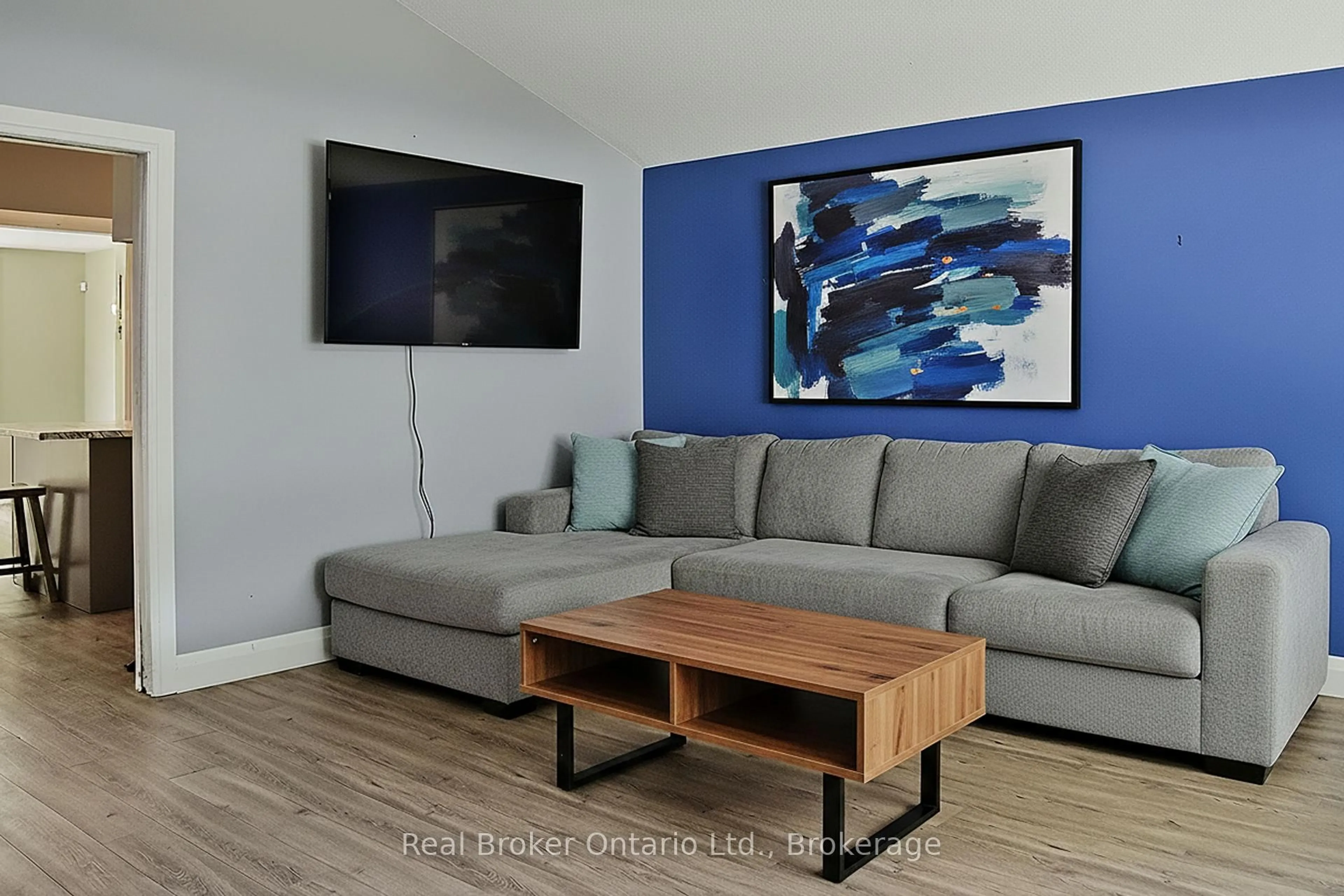 Living room with furniture, wood/laminate floor for 354 Goderich St, Saugeen Shores Ontario N0H 2C1