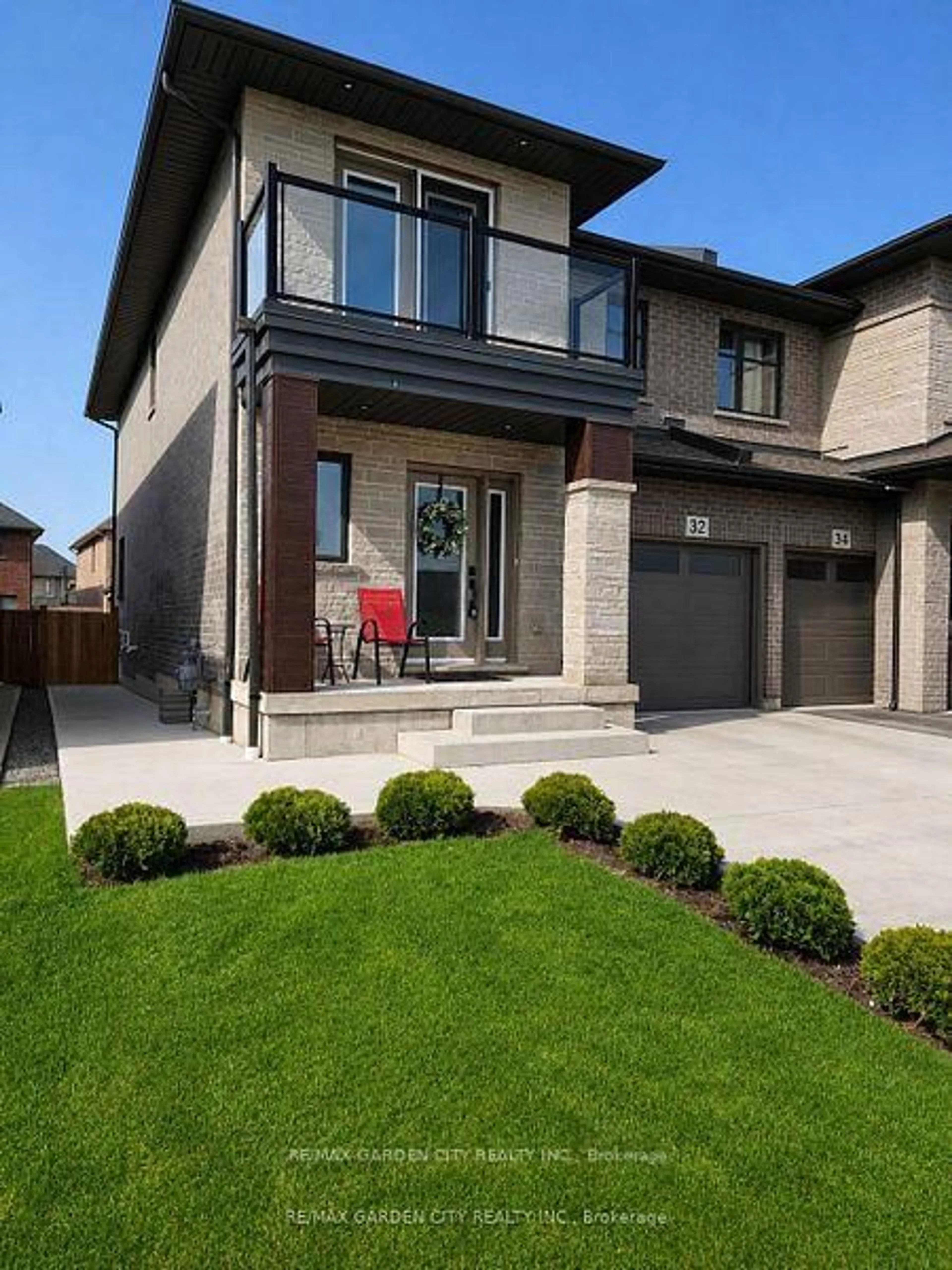 Home with brick exterior material, street for 32 Jayla Lane, West Lincoln Ontario L0R 2A0