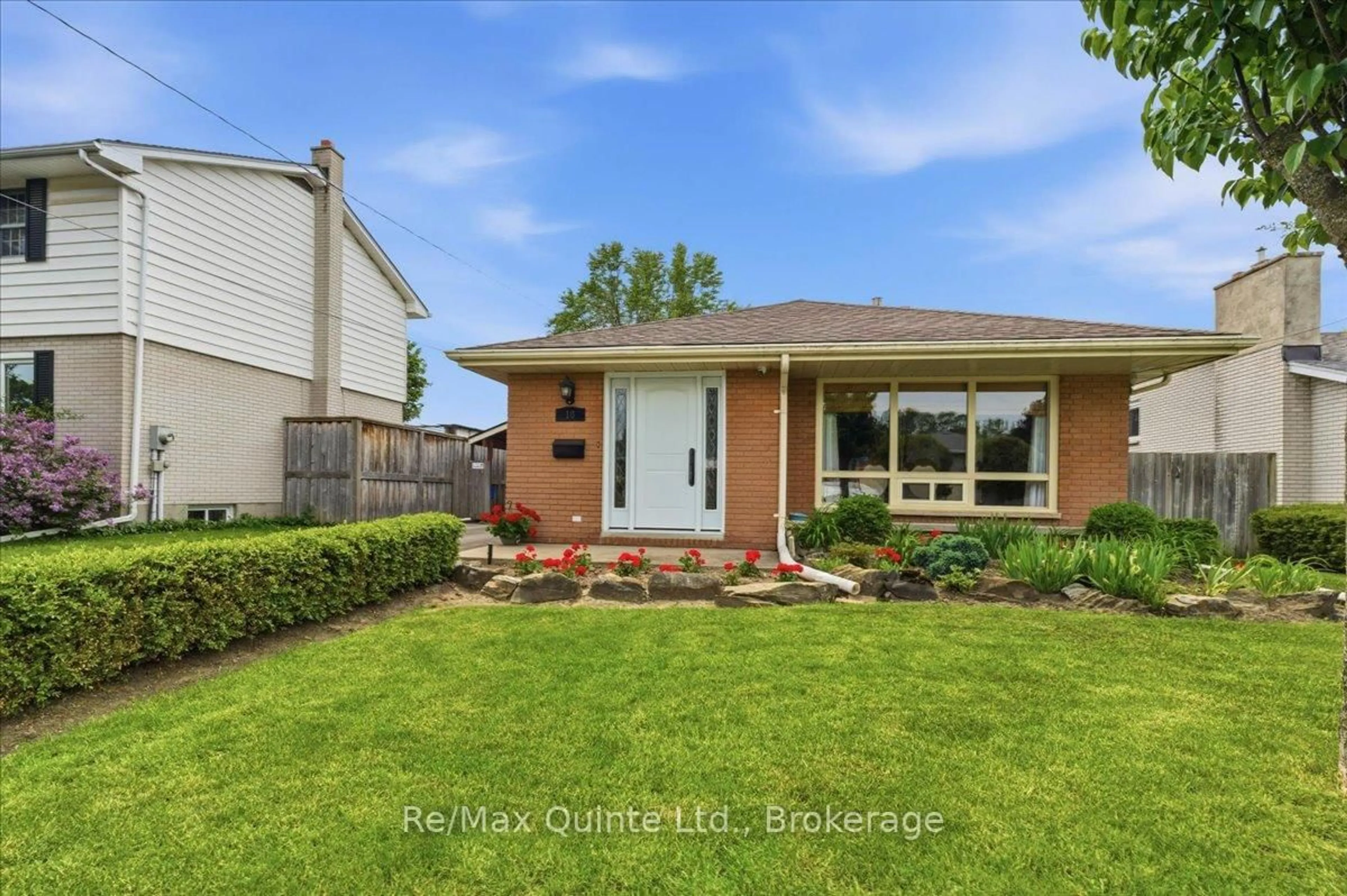 Home with brick exterior material, street for 18 Plaza Sq, Belleville Ontario K8N 4J3